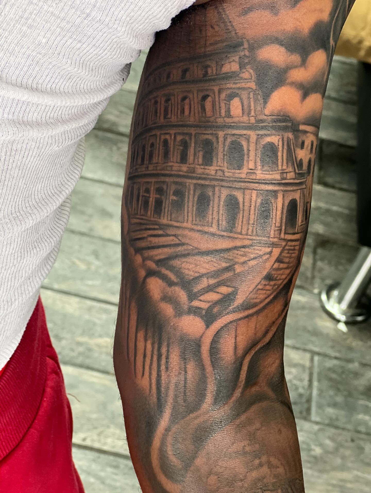 Colosseum realism tattoo on the forearm by Dany