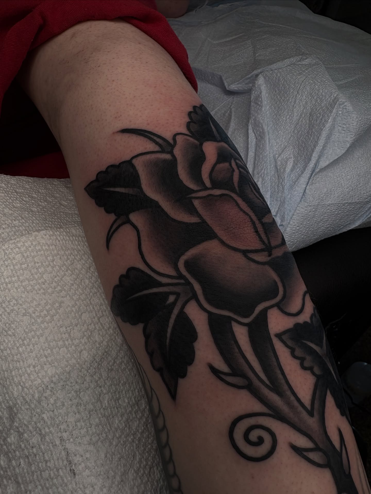 Rose black and grey tattoo on the forearm by Dallas Tattoo Artist