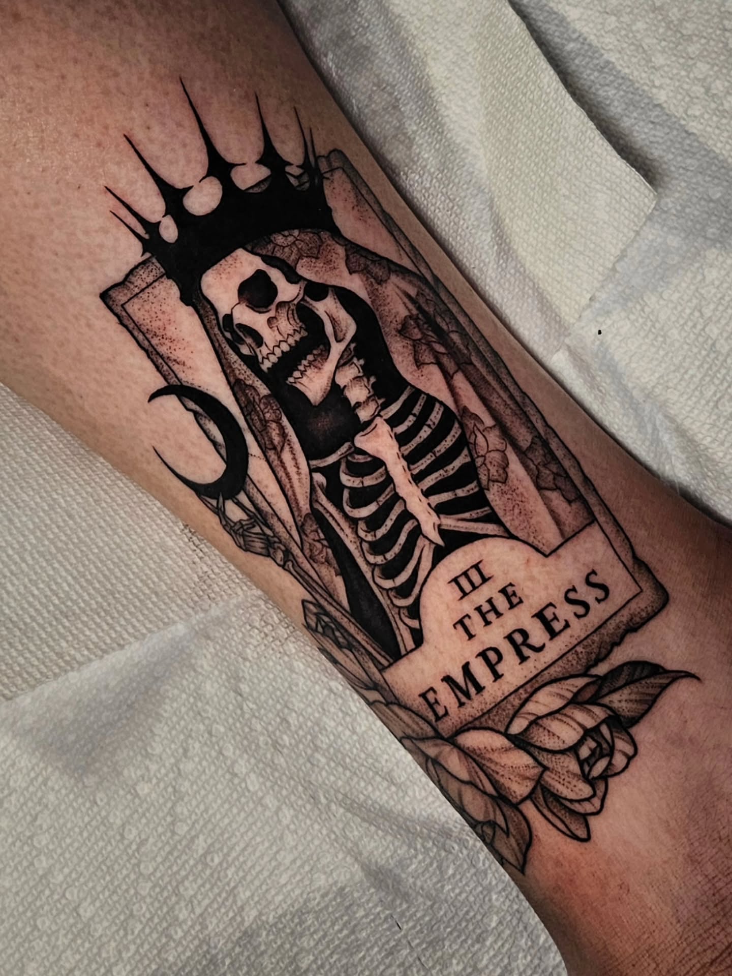 The empress tarot card dark realism tattoo on the forearm by Courtlyn Bliss