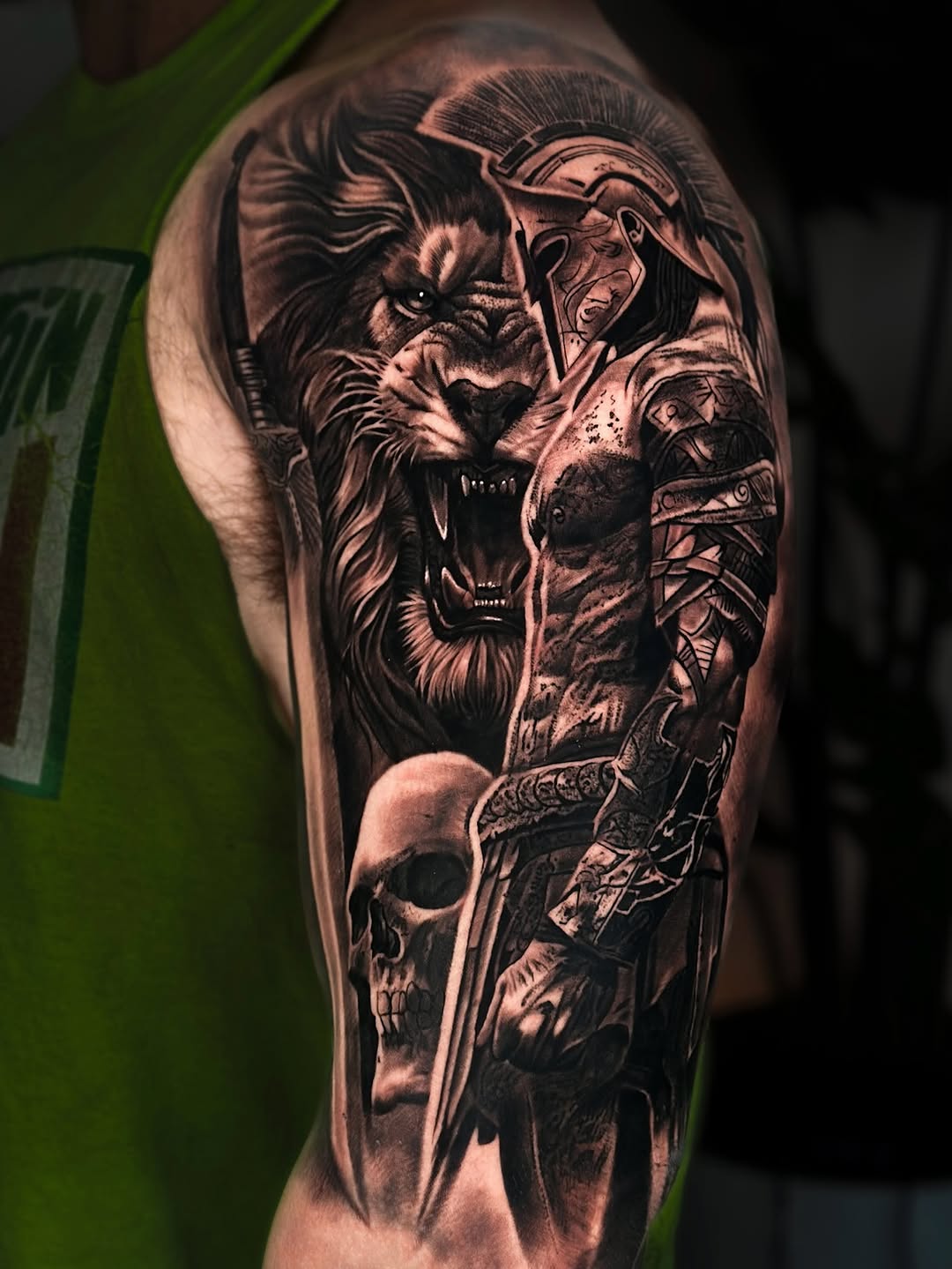 Spartan warrior, lion, and skull realism tattoo on the forearm by Nathan, Charlotte, North Carolina