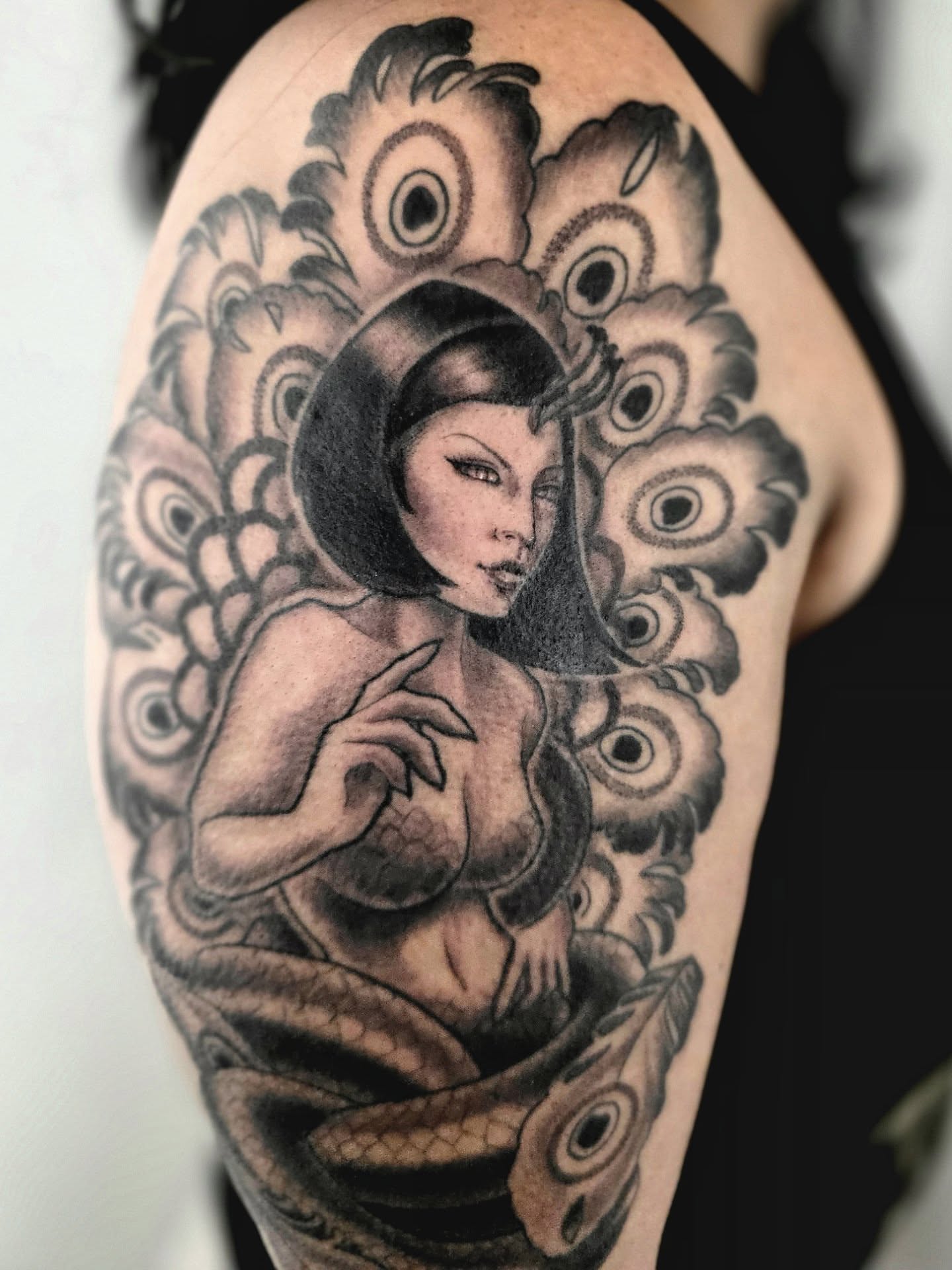 Woman with snake American traditional tattoo on the shoulder by April High ☆ Tattoo Artist
