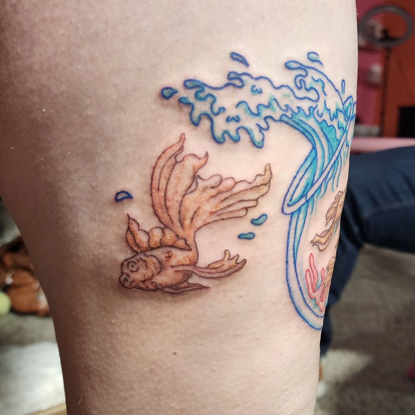 Mermaid tail new school tattoo on the thigh by K.F. Golden