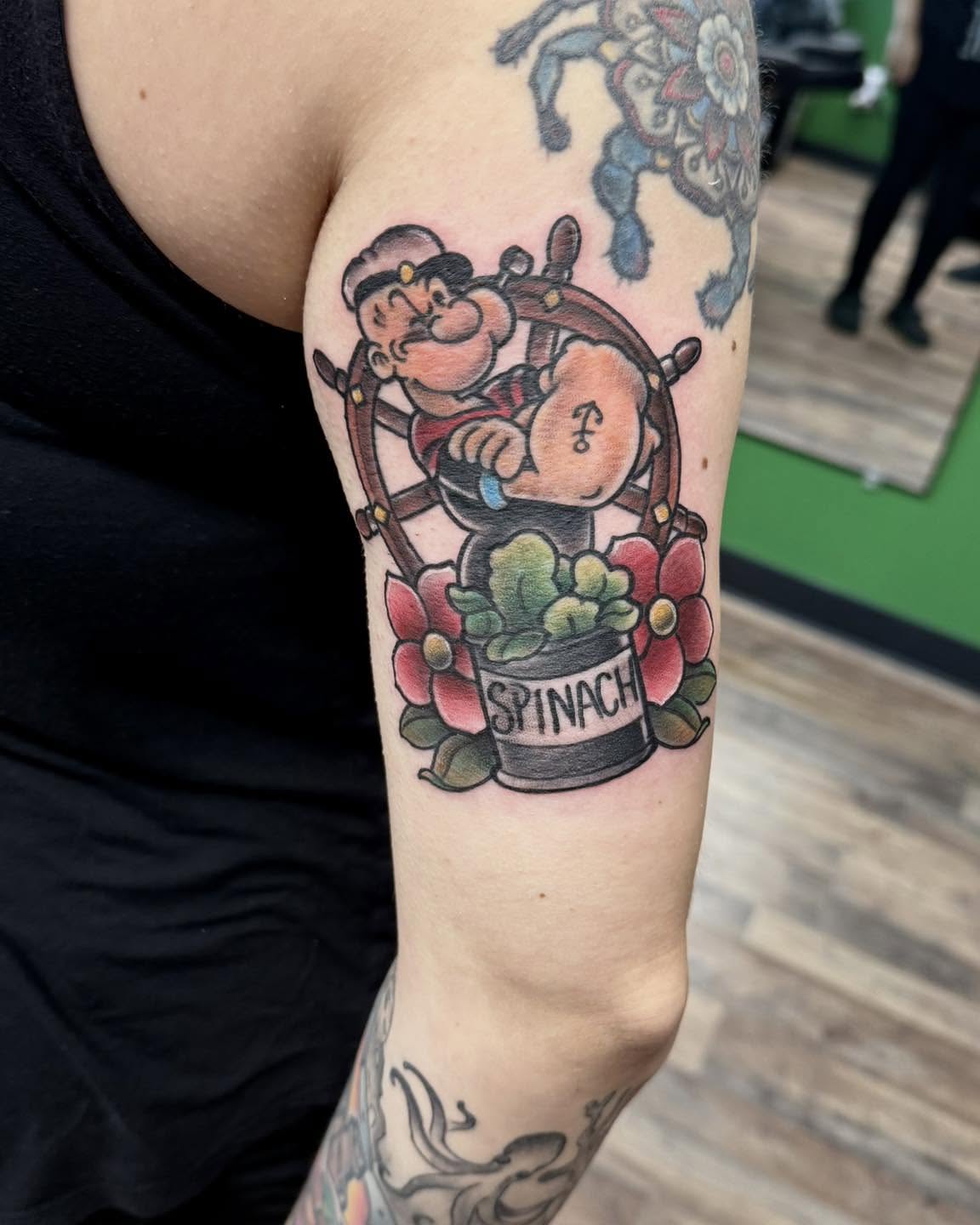 Popeye with spinach can American traditional tattoo on the forearm by Josh Roberts, Franklin, Ohio