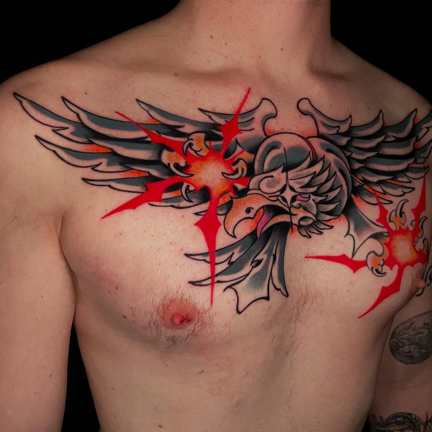 Phoenix neo-traditional tattoo on the chest by Bryan Ortega