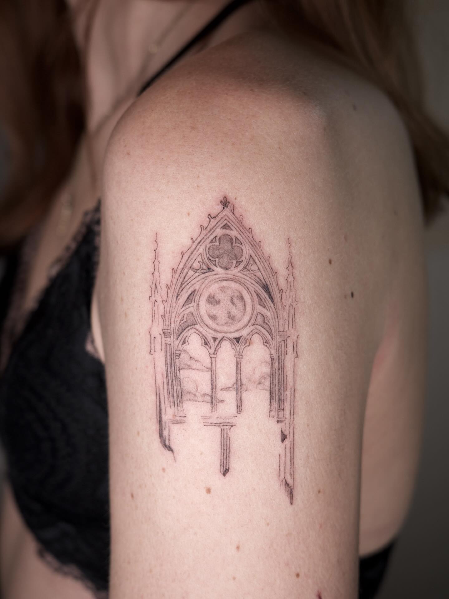 Gothic window black and grey tattoo on the shoulder by It’s ya girl, KB