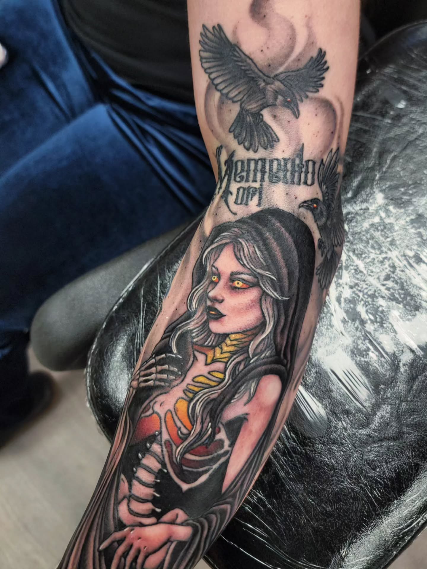 Woman with crow realism tattoo on the forearm by Chantel Chan, Portland, Oregon