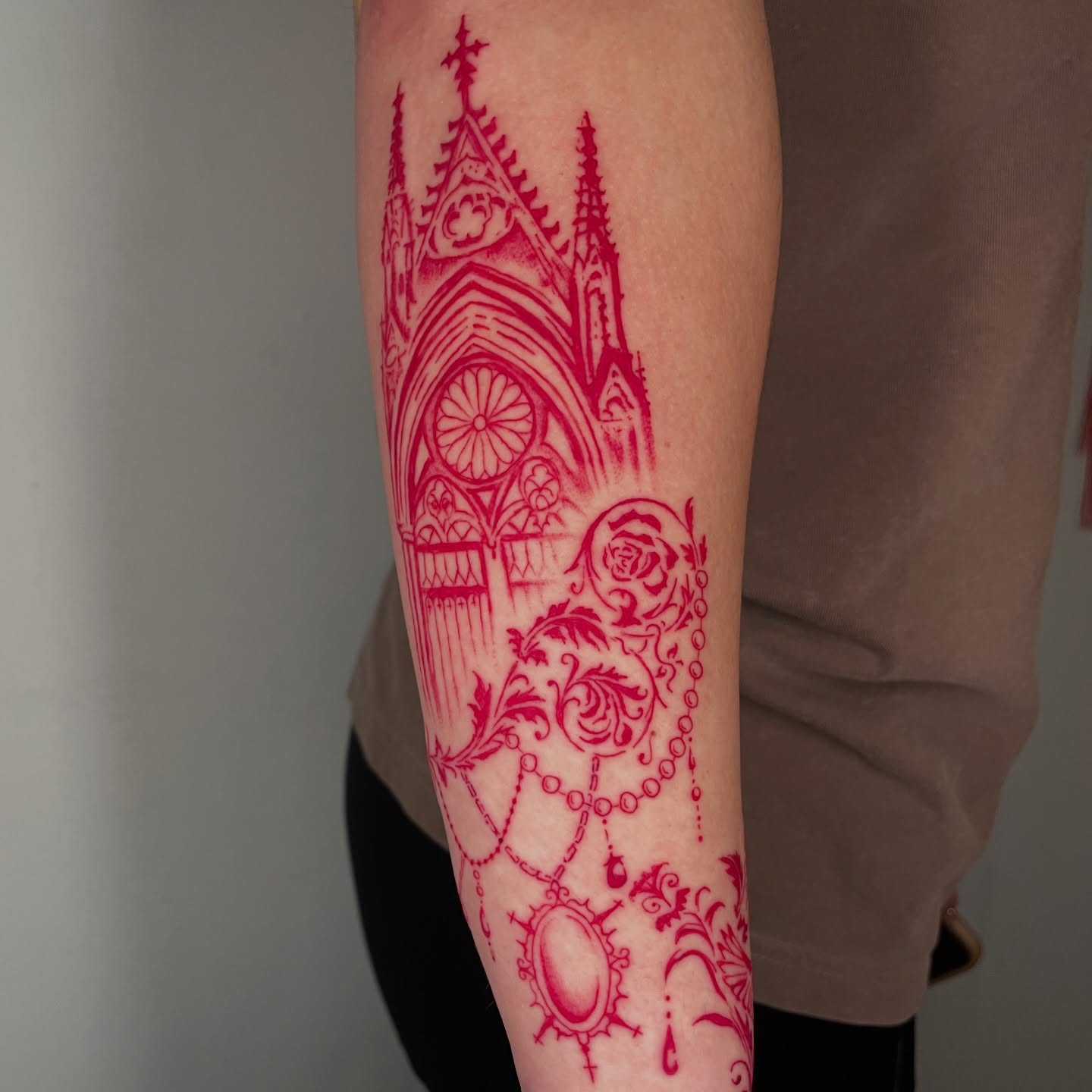 Gothic cathedral ornamental tattoo on the forearm by Sophia Tattoo