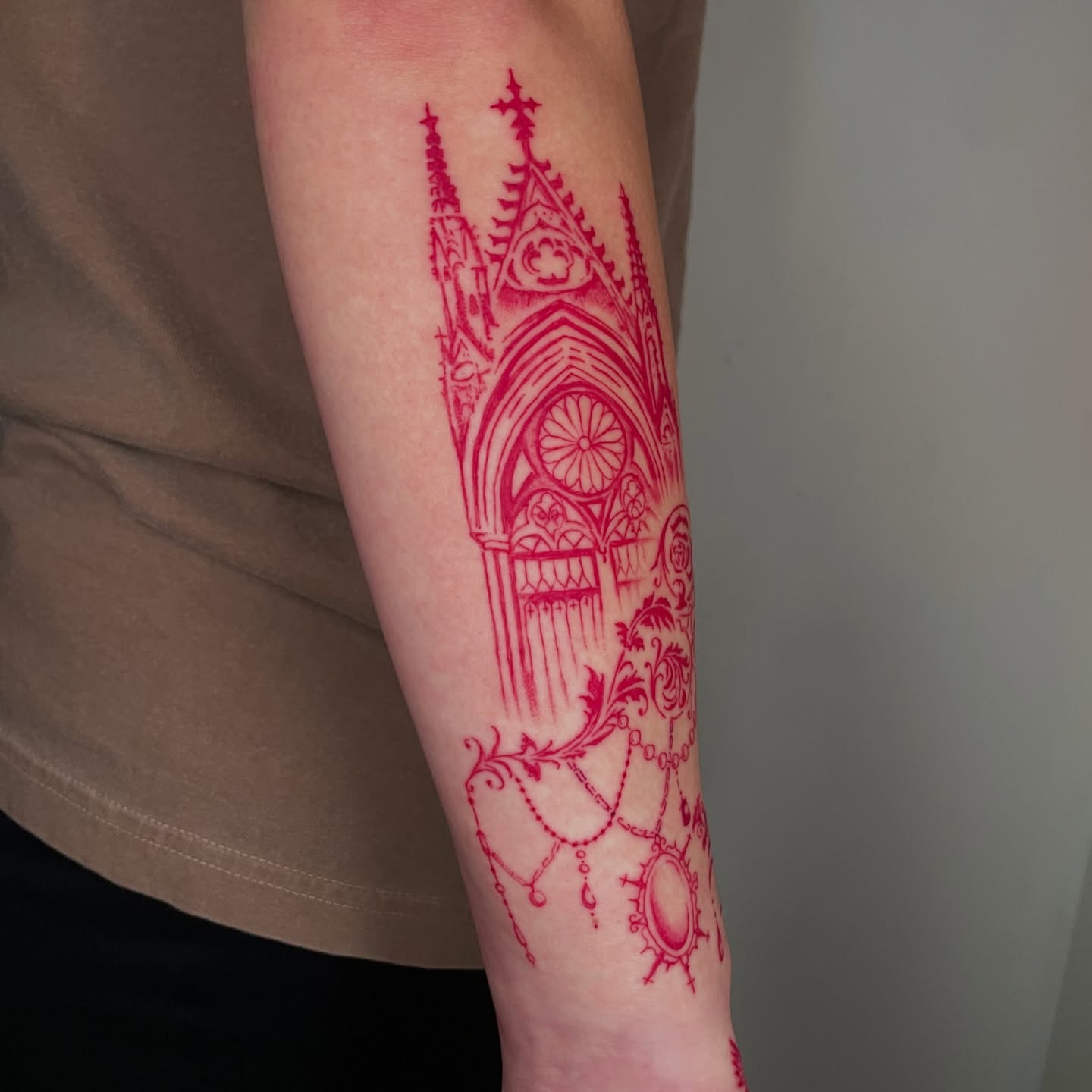 Gothic cathedral tattoo on the forearm by Sophia Tattoo