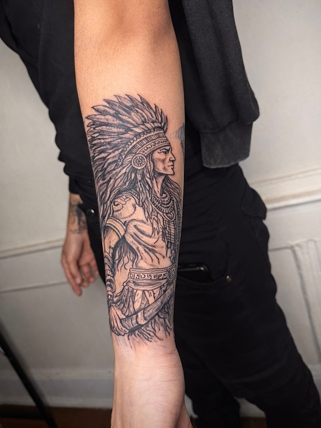 Native american chief black and grey tattoo on the forearm by JayyeSosa