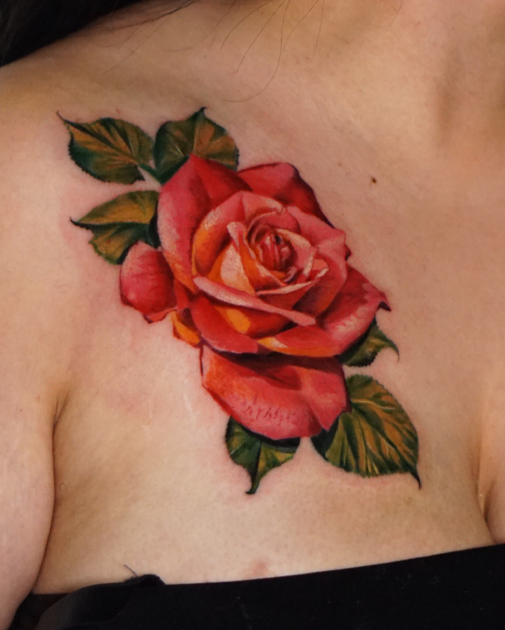 Rose realism tattoo on the back by San Diego Color Realism and Neotraditional
