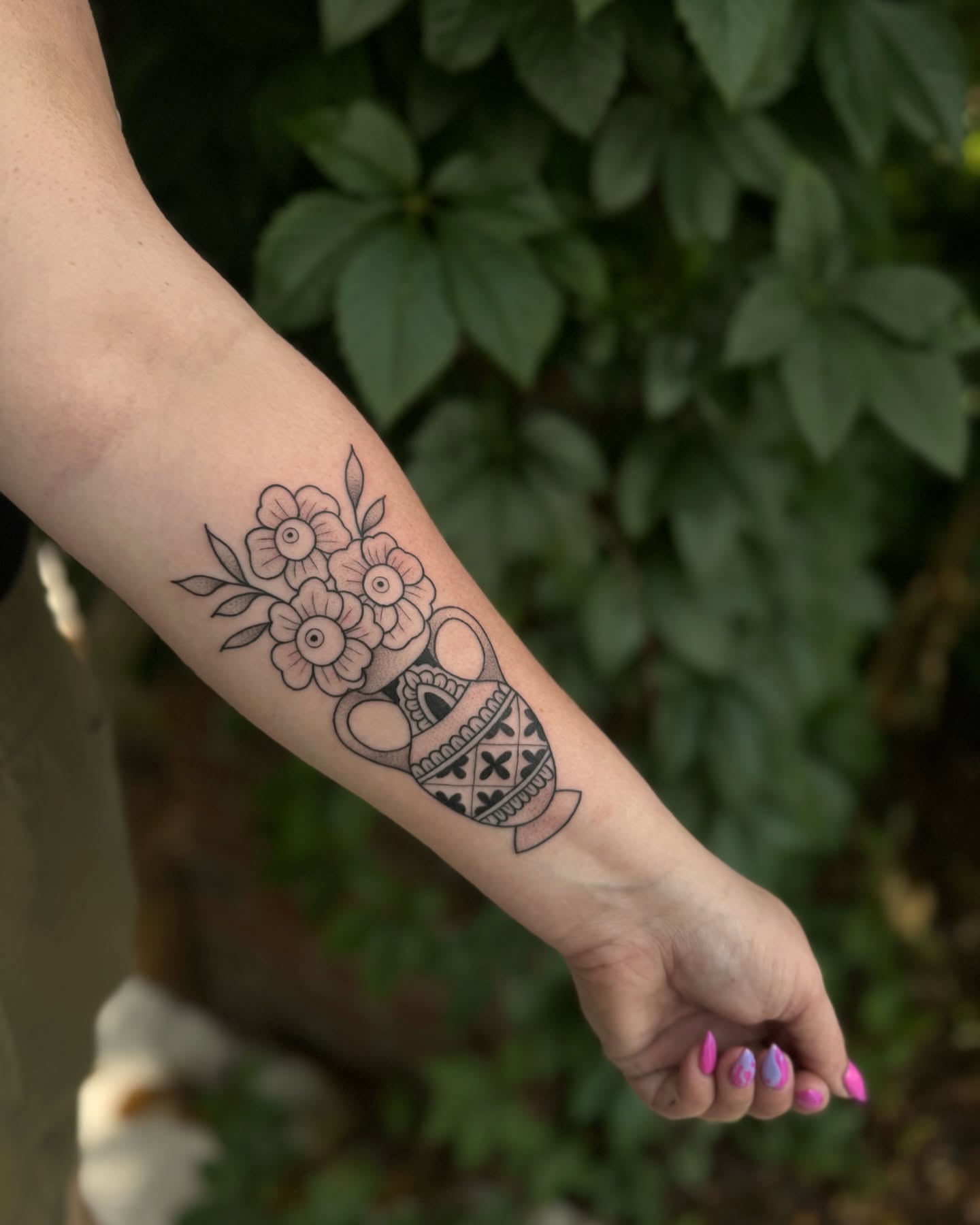 Flowers in vase black and grey tattoo on the forearm by ꧁꧁Hayley꧂꧂