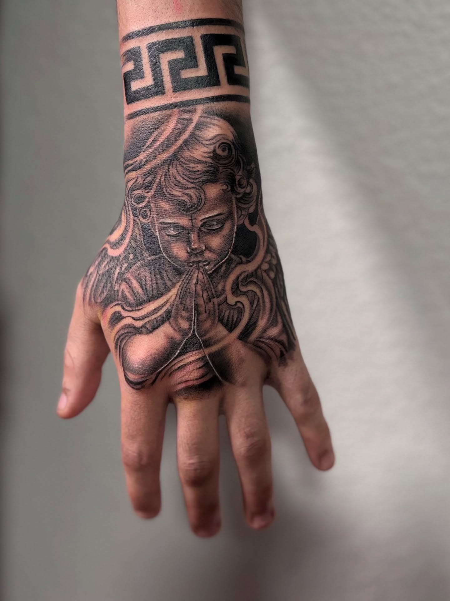 Medusa black and grey tattoo on the hand by @tattoosbyadrian