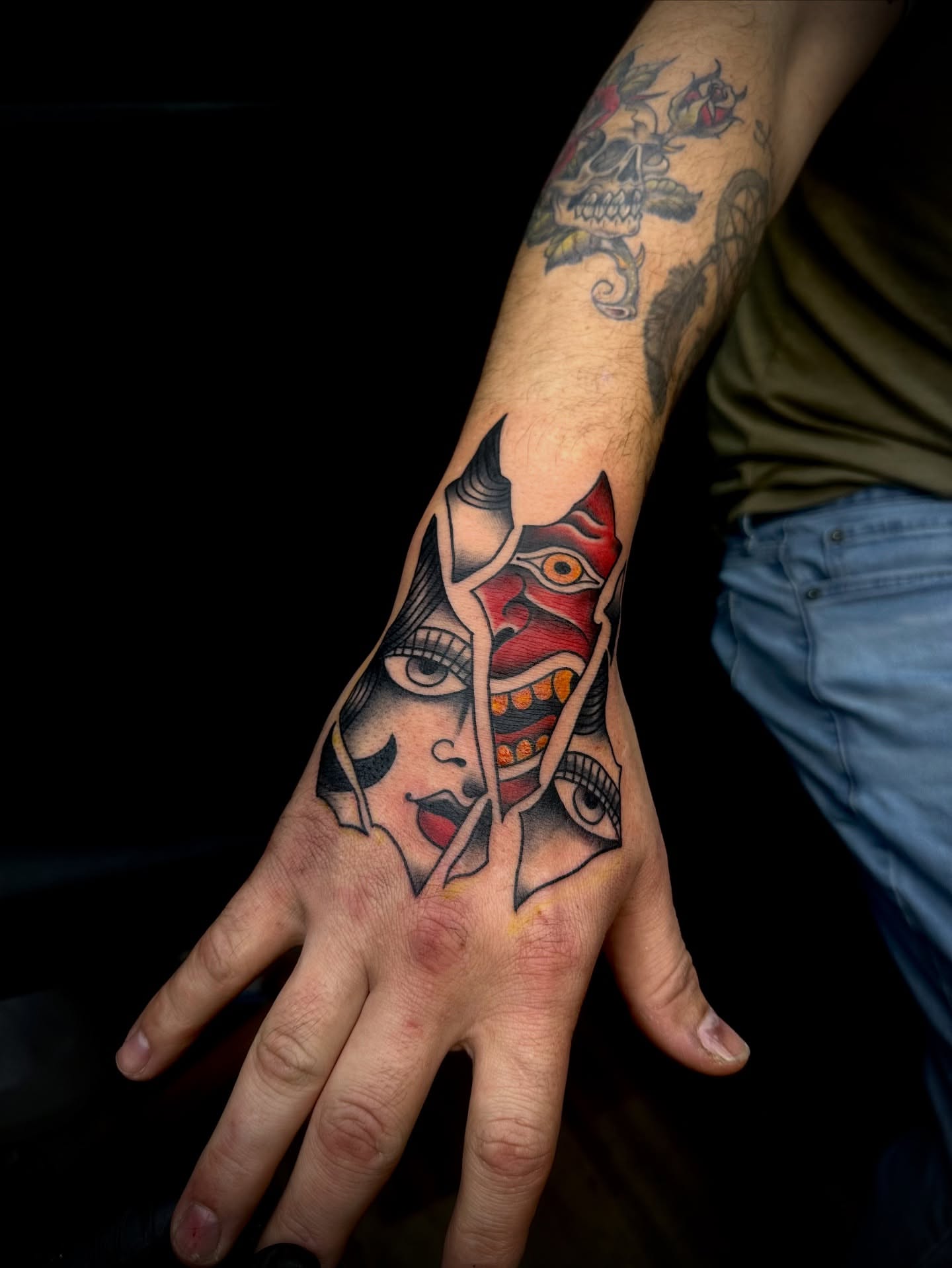 Woman's face neo-traditional tattoo on the hand by Kassie Perian