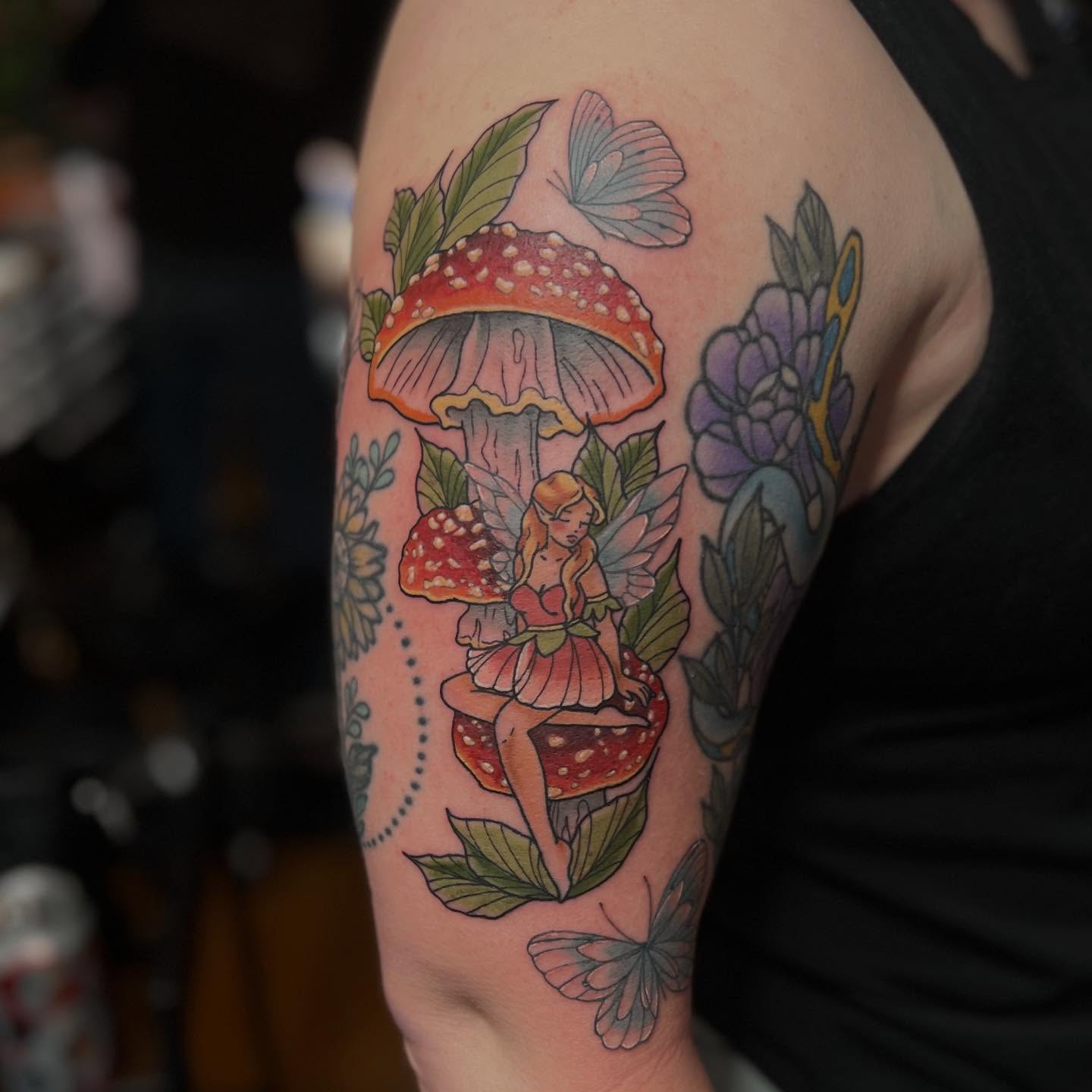 Fairy and mushrooms dotwork tattoo on the forearm by Brooke, Kansas City, Missouri