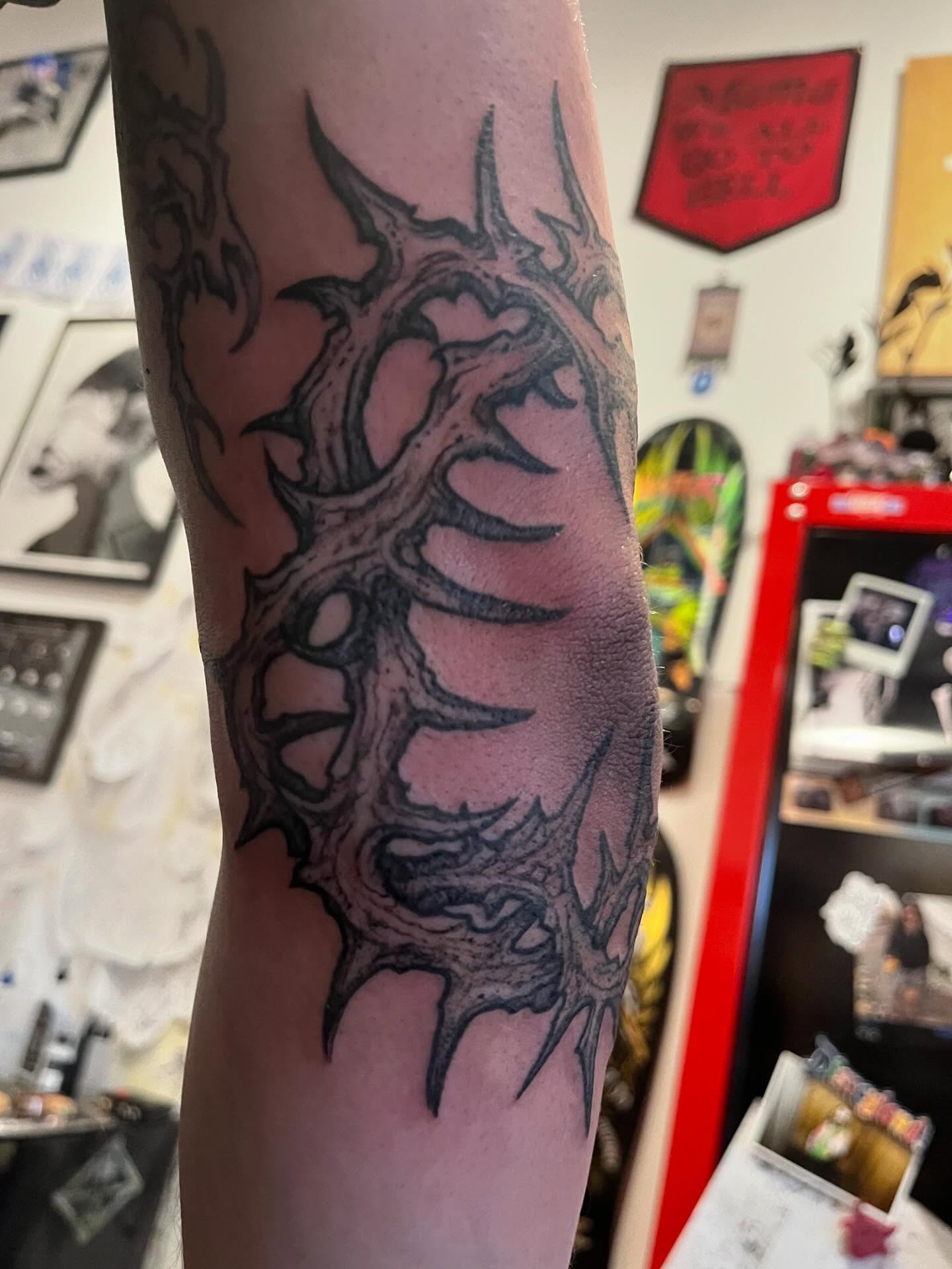 Spiky organic form geometric tattoo on the forearm by Nathan Esteras