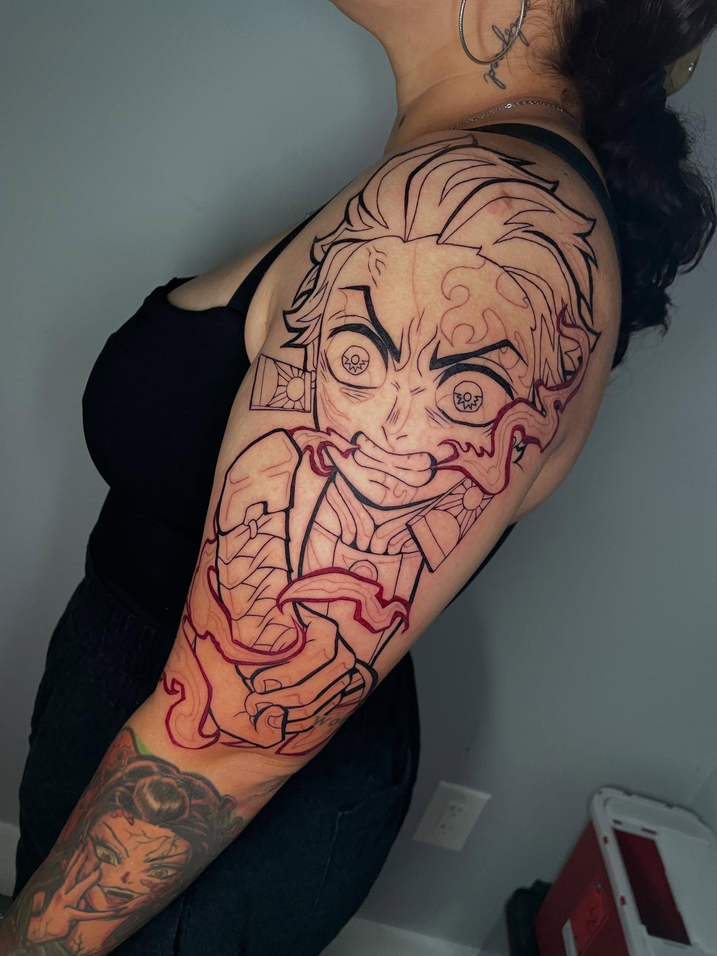 Anime character anime tattoo on the shoulder by Xena