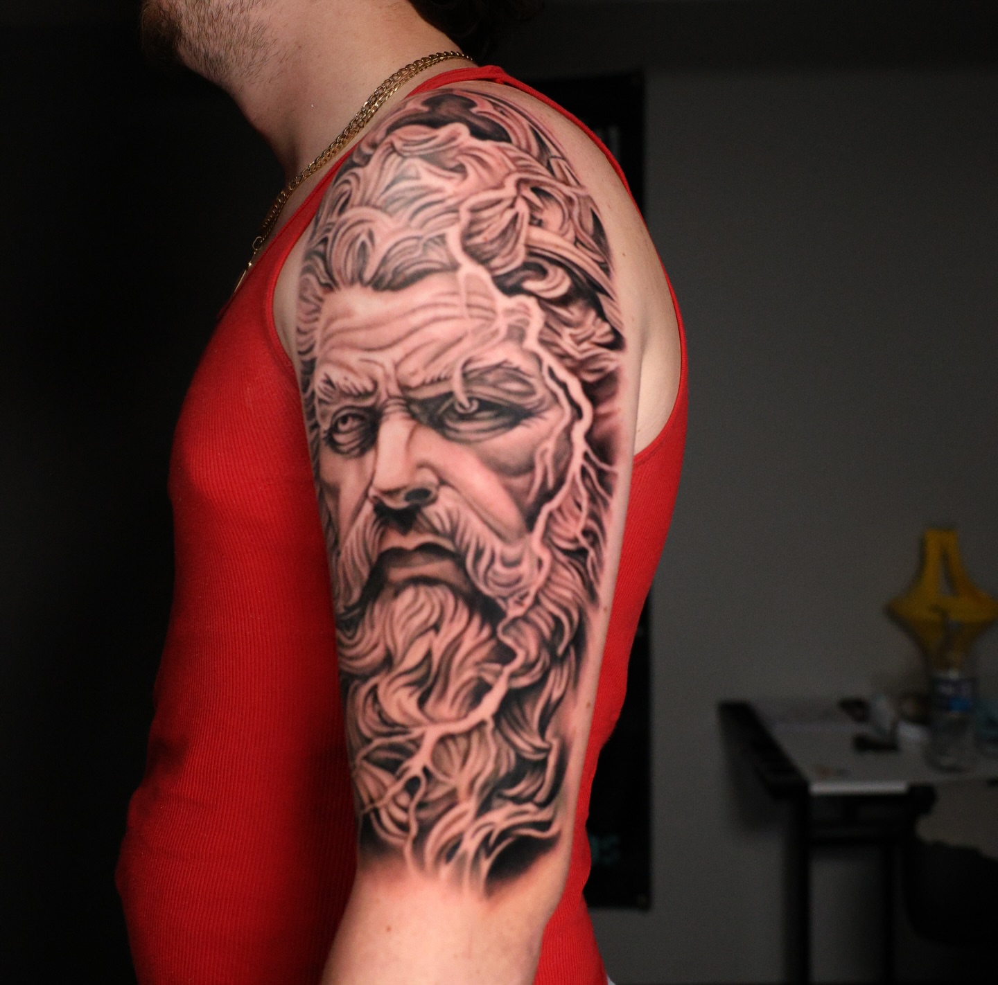 Bearded man realism tattoo on the upper arm by InkbyEase, Wayne, New Jersey