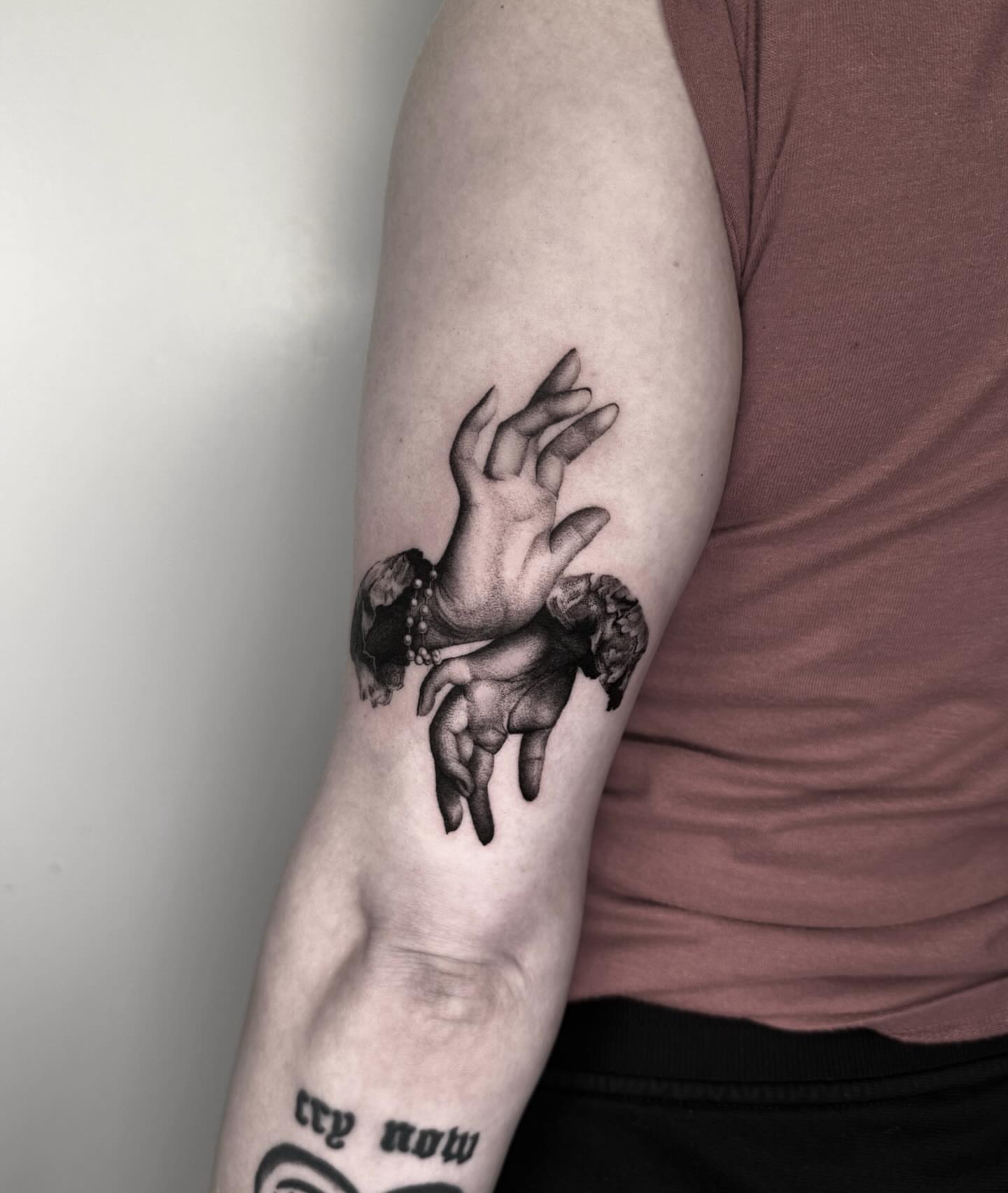 Hands and heart realism tattoo on the forearm by ππππππ