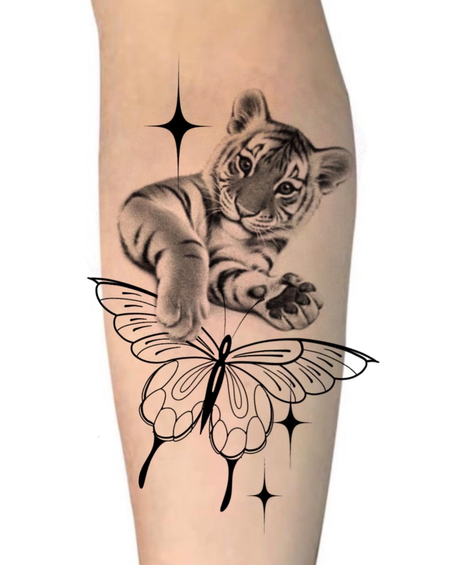Tiger and butterfly realism tattoo on the forearm by Avery Mullins