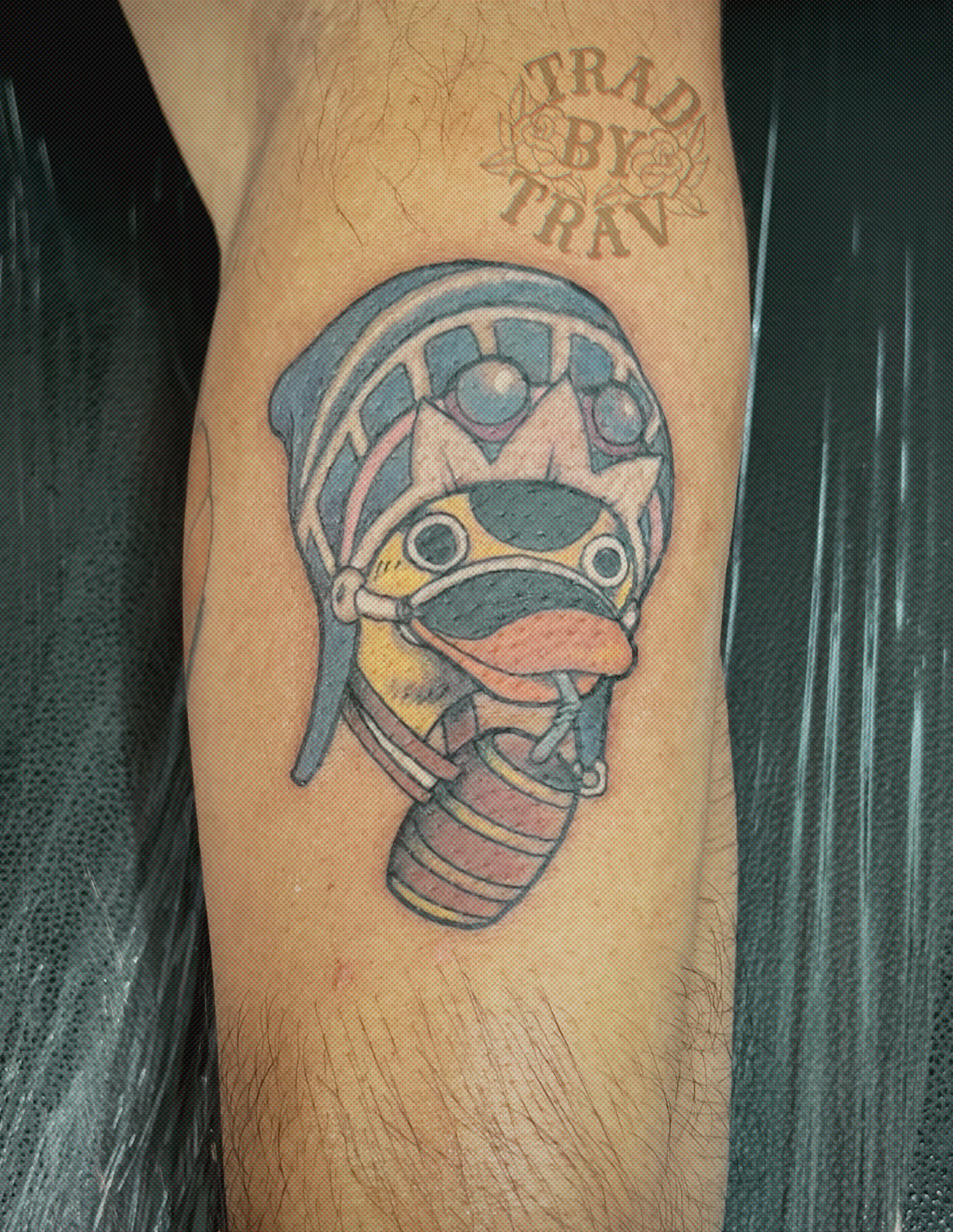 Duck helmet American traditional tattoo on the forearm by Travis B