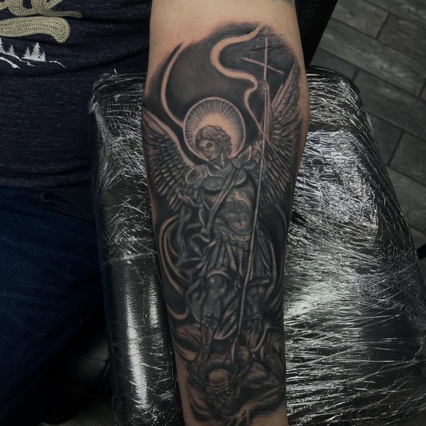 St. michael the archangel realism tattoo on the forearm by Dany