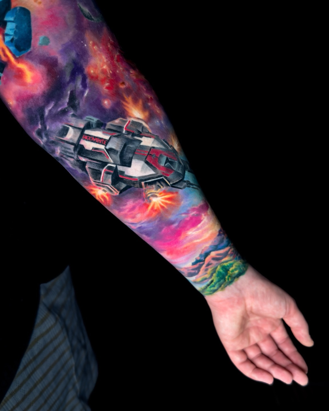 Spacecraft realism tattoo on the forearm by Amy Zager
