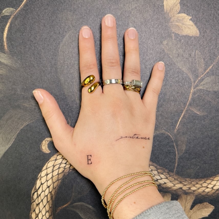 Patience lettering script tattoo on the hand by Fineline Tattoos π€ Hailey L.
