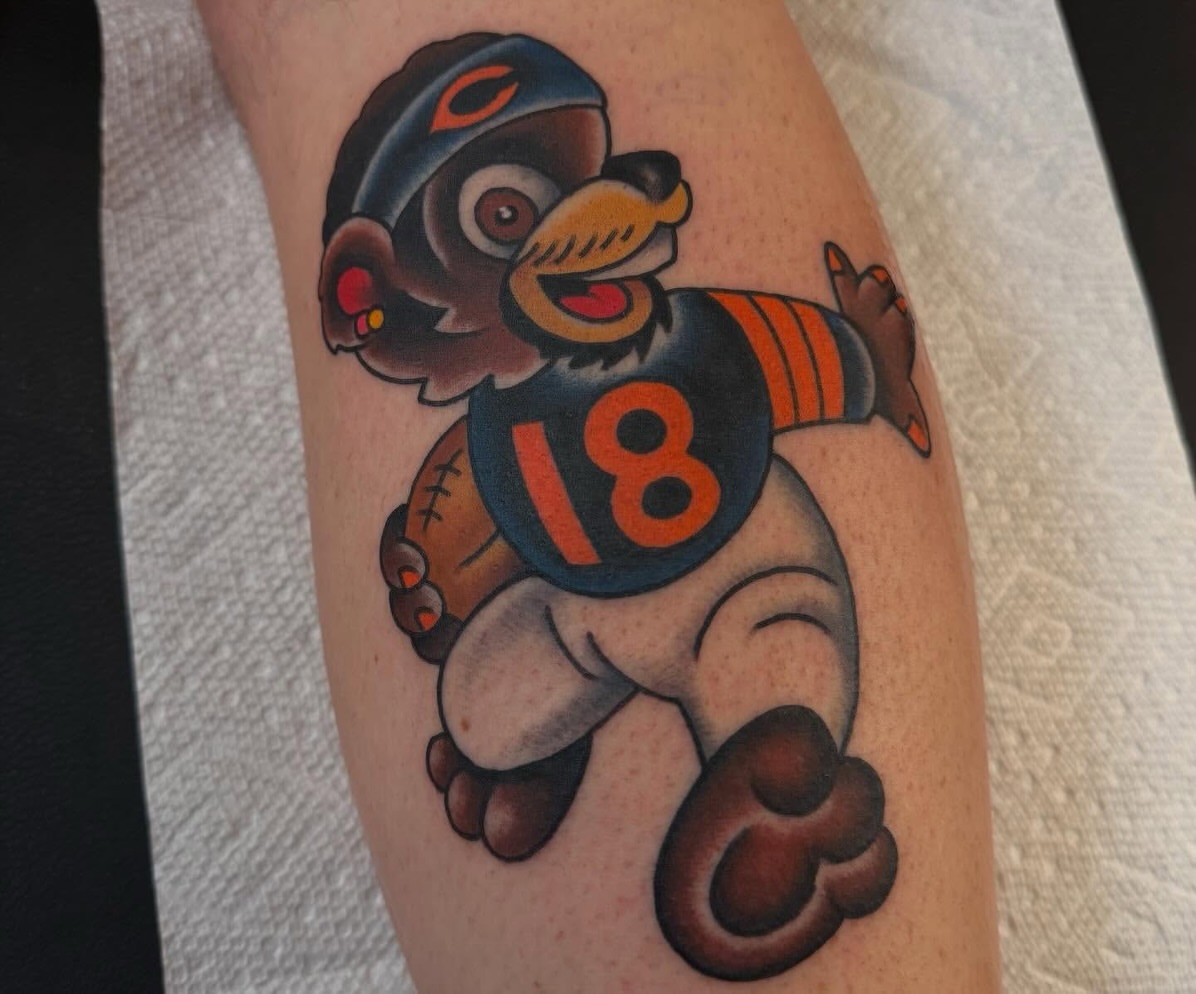 Football bear American traditional tattoo on the forearm by Grandma Approved, Chicago, Illinois