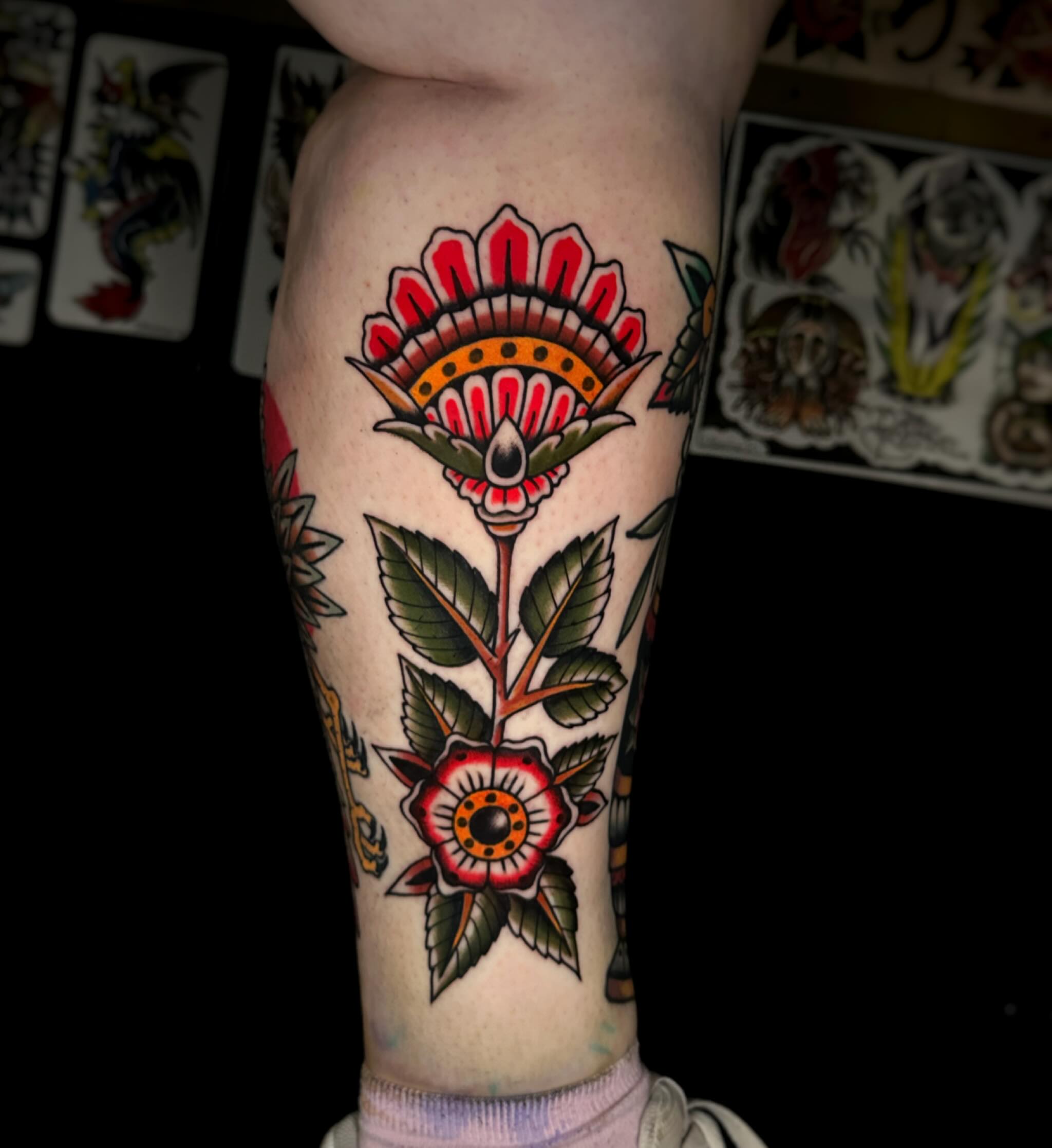 Floral arrangement American traditional tattoo on the forearm by Alex Finnerty, Reading, Massachusetts
