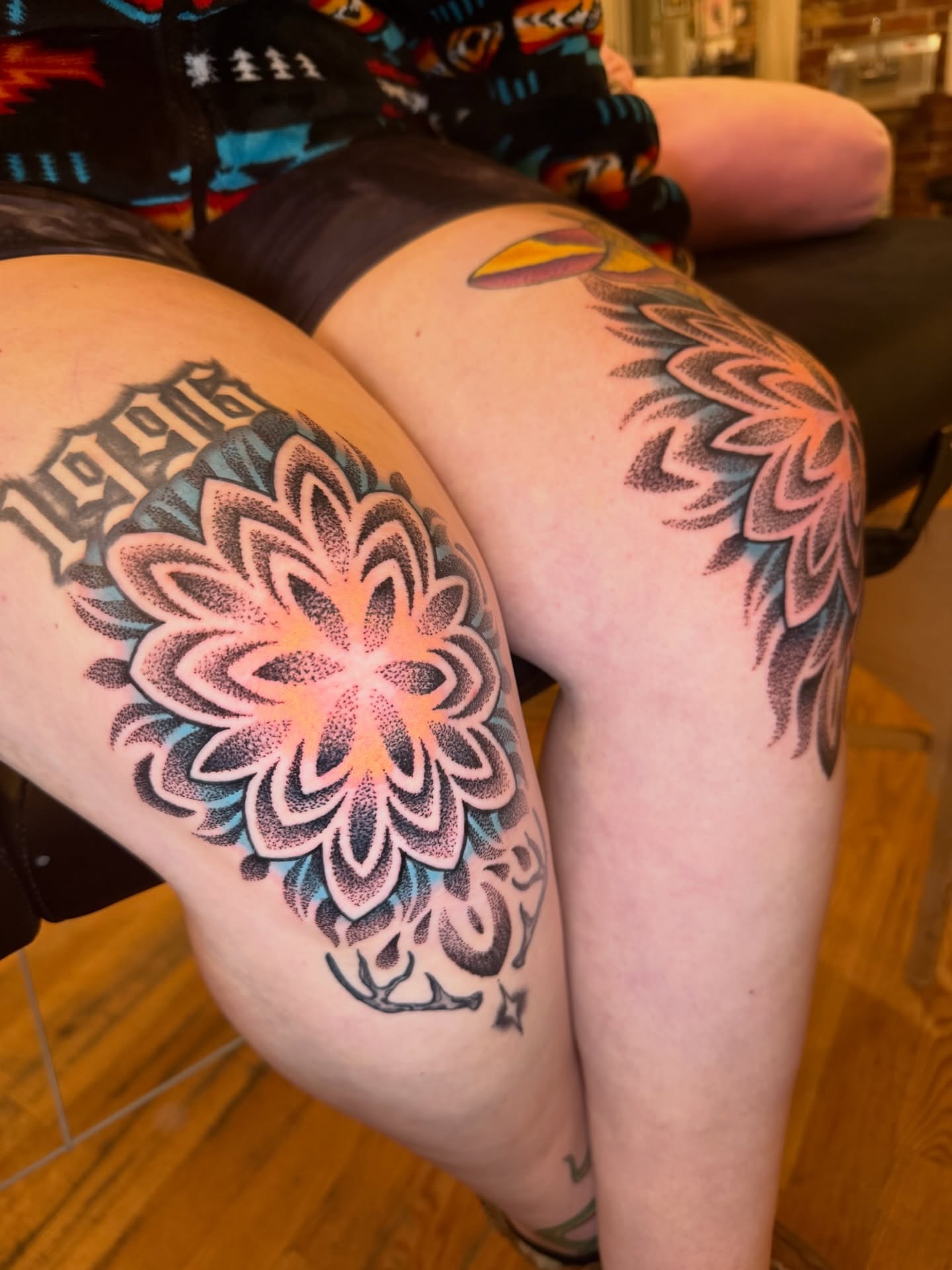 Floral mandala dotwork tattoo on the thigh by Kevin R. Onley
