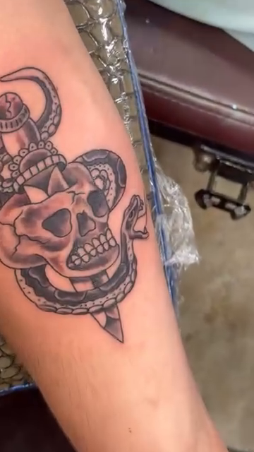 Skull, dagger, and snake American traditional tattoo by Shane Montie, Killeen, Texas