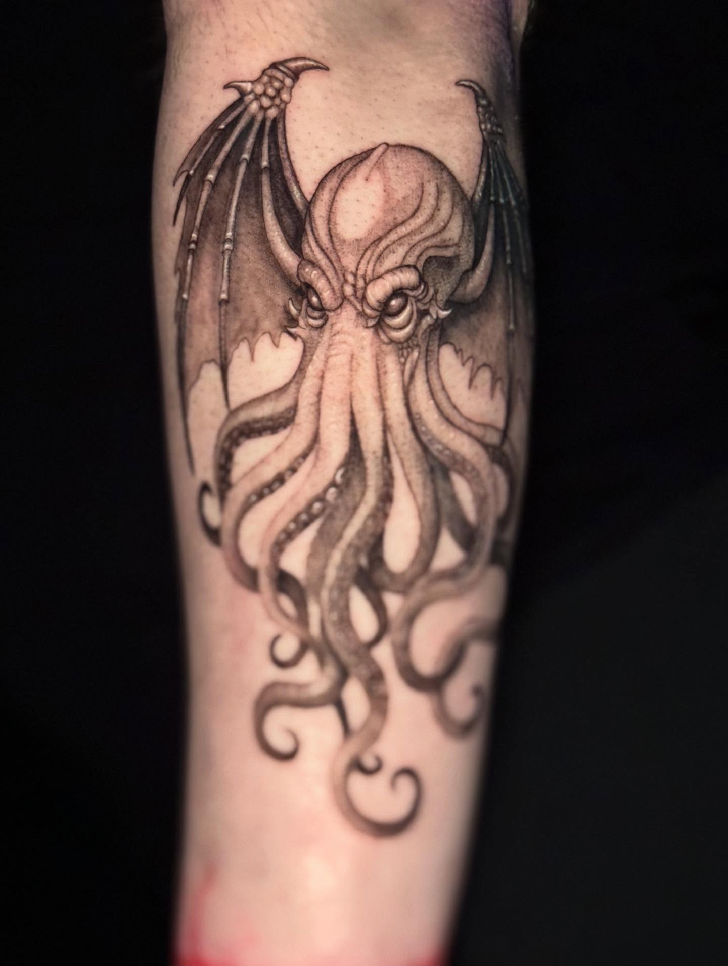 Cthulhu realism tattoo on the forearm by Leslea Hipp
