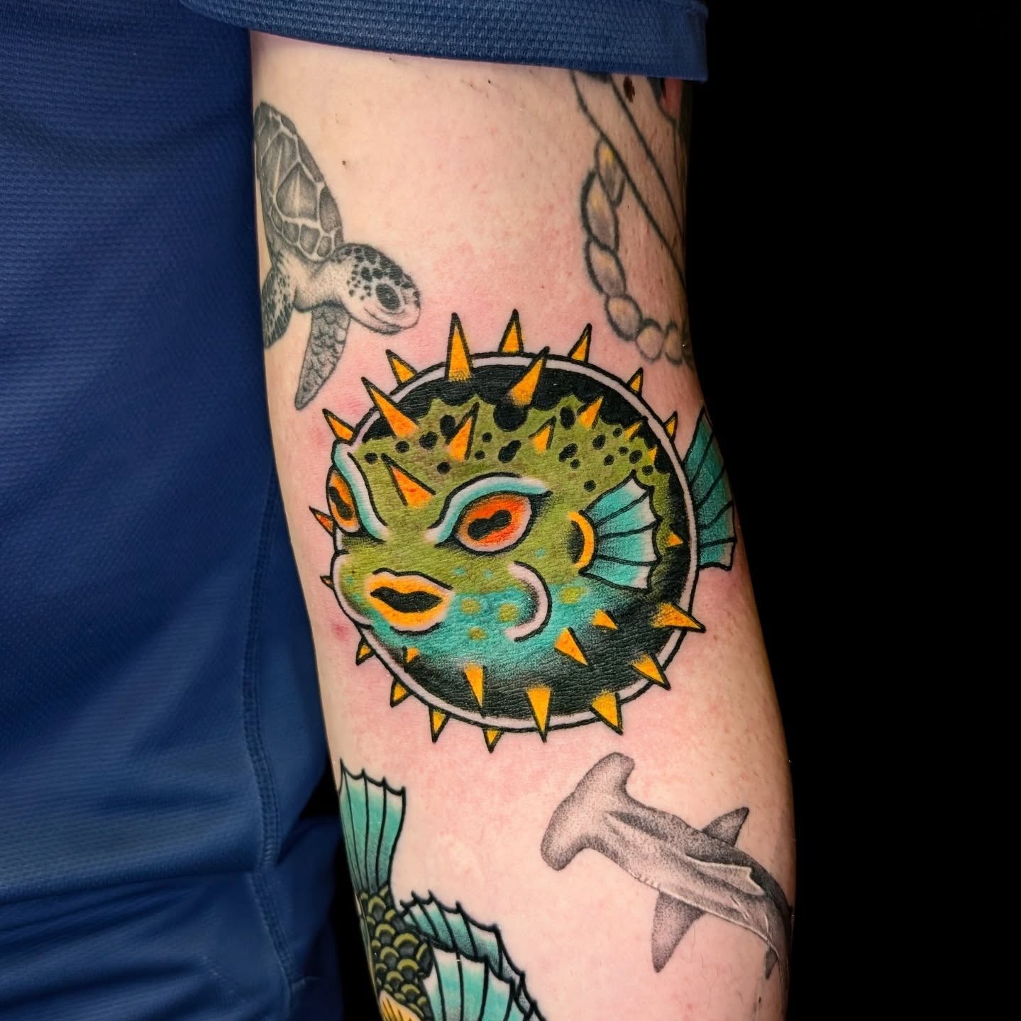 Puffer fish American traditional tattoo on the forearm by Erik O'Steen, Medford, Massachusetts