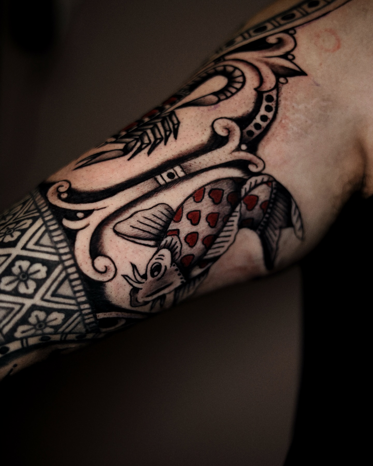Fish American traditional tattoo on the forearm by Dylan Mott