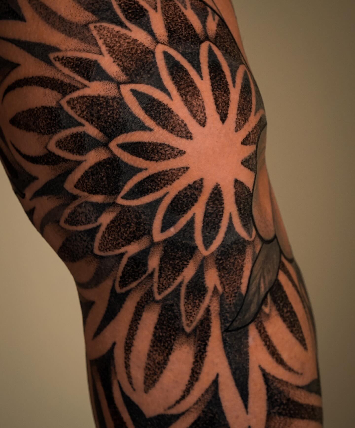 Flower dotwork tattoo on the forearm by Katherin Plaza