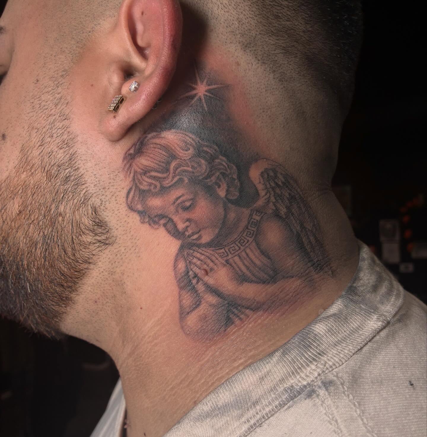 Angel realism tattoo on the neck by Kat π