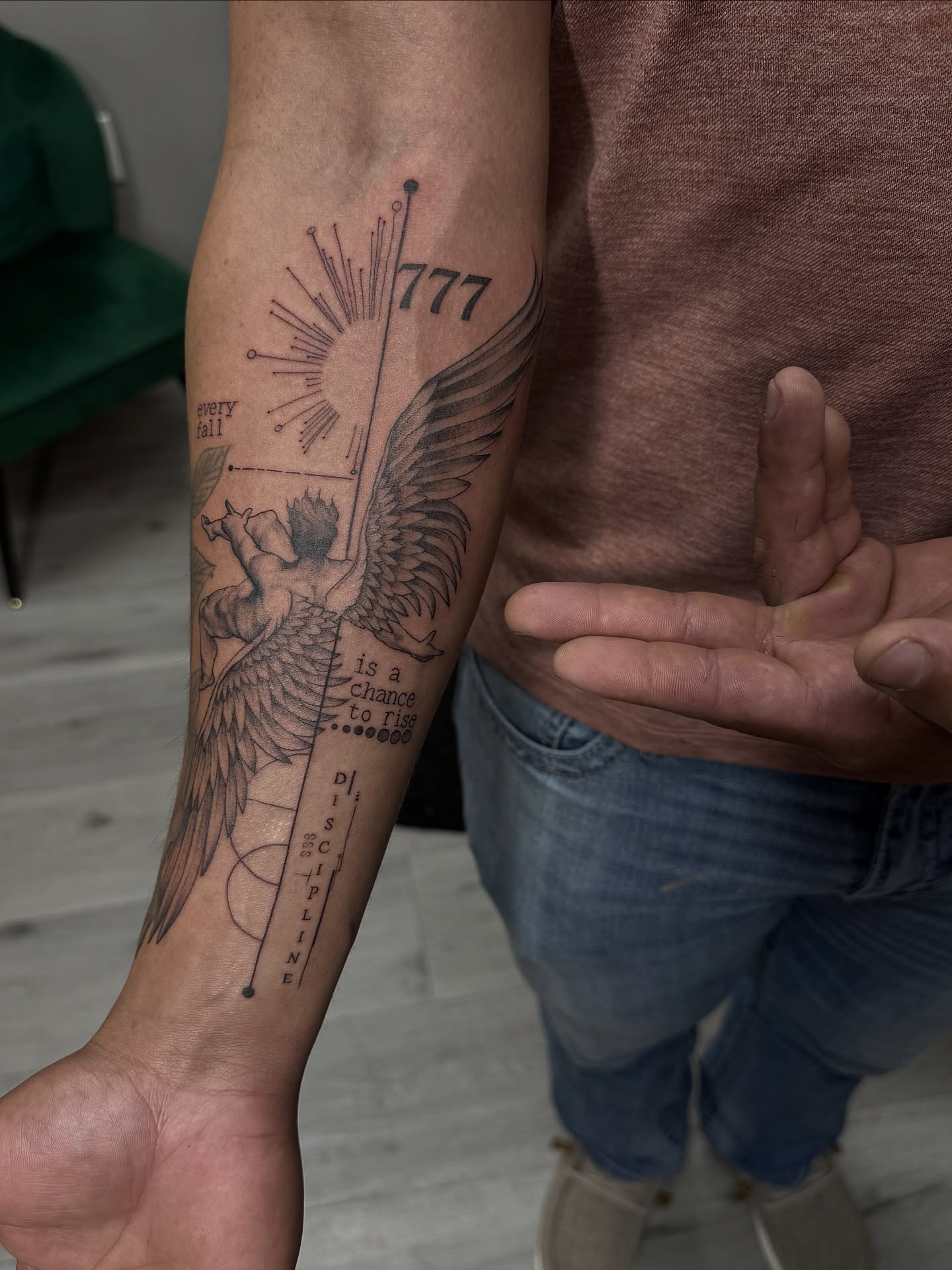 Angel wings and sun dotwork tattoo on the forearm by Mo Dinero🎰