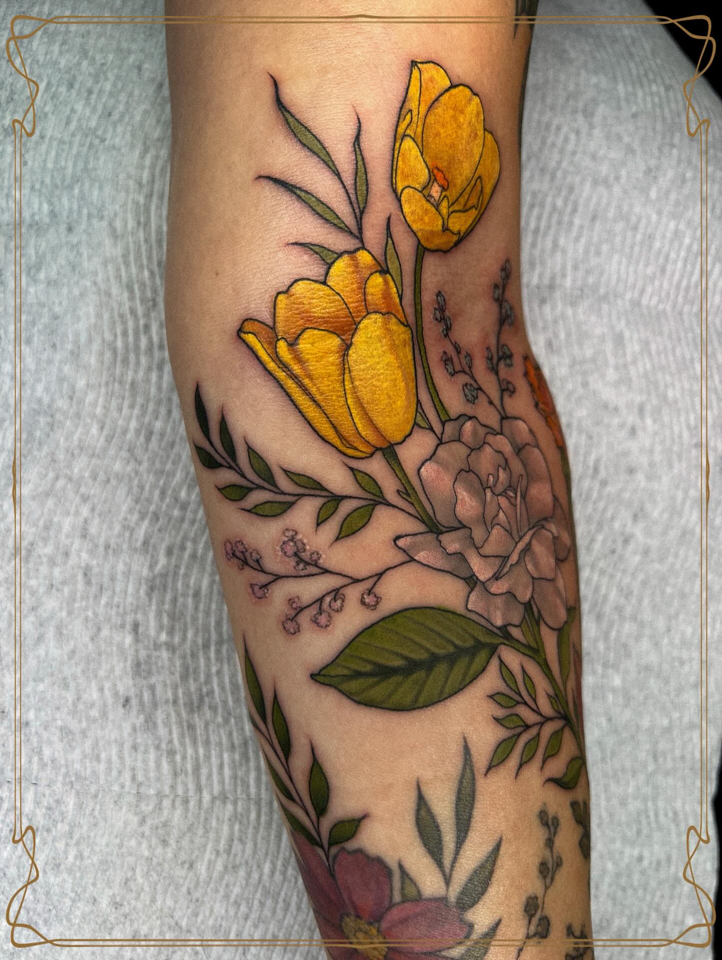 Yellow tulips and pink peony realism tattoo on the forearm by Severin Black