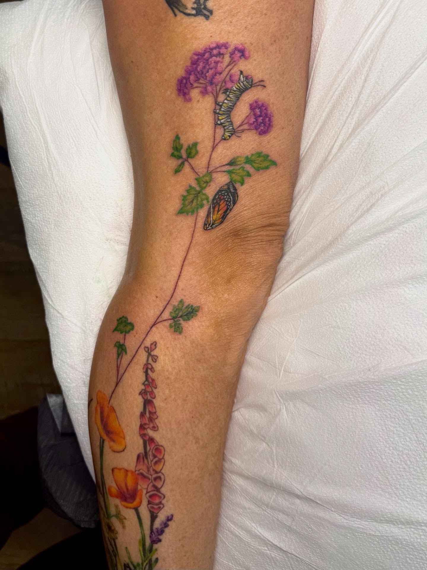 Flower vine with butterfly new school tattoo on the forearm by Taylor Kay 🌿