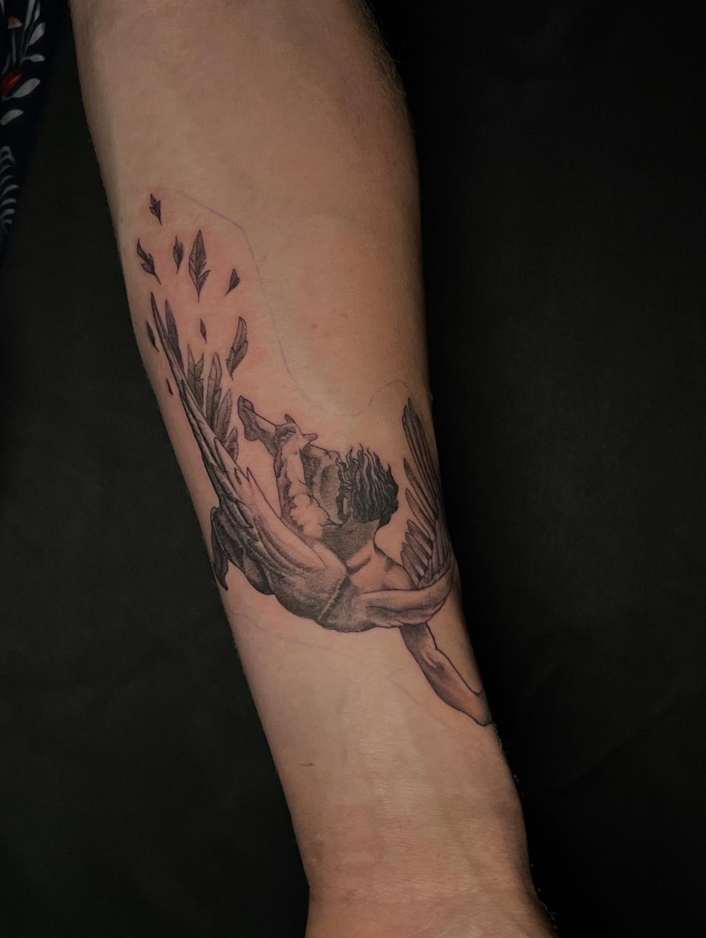 Couple embracing realism tattoo on the forearm by Lord Daniel Serna