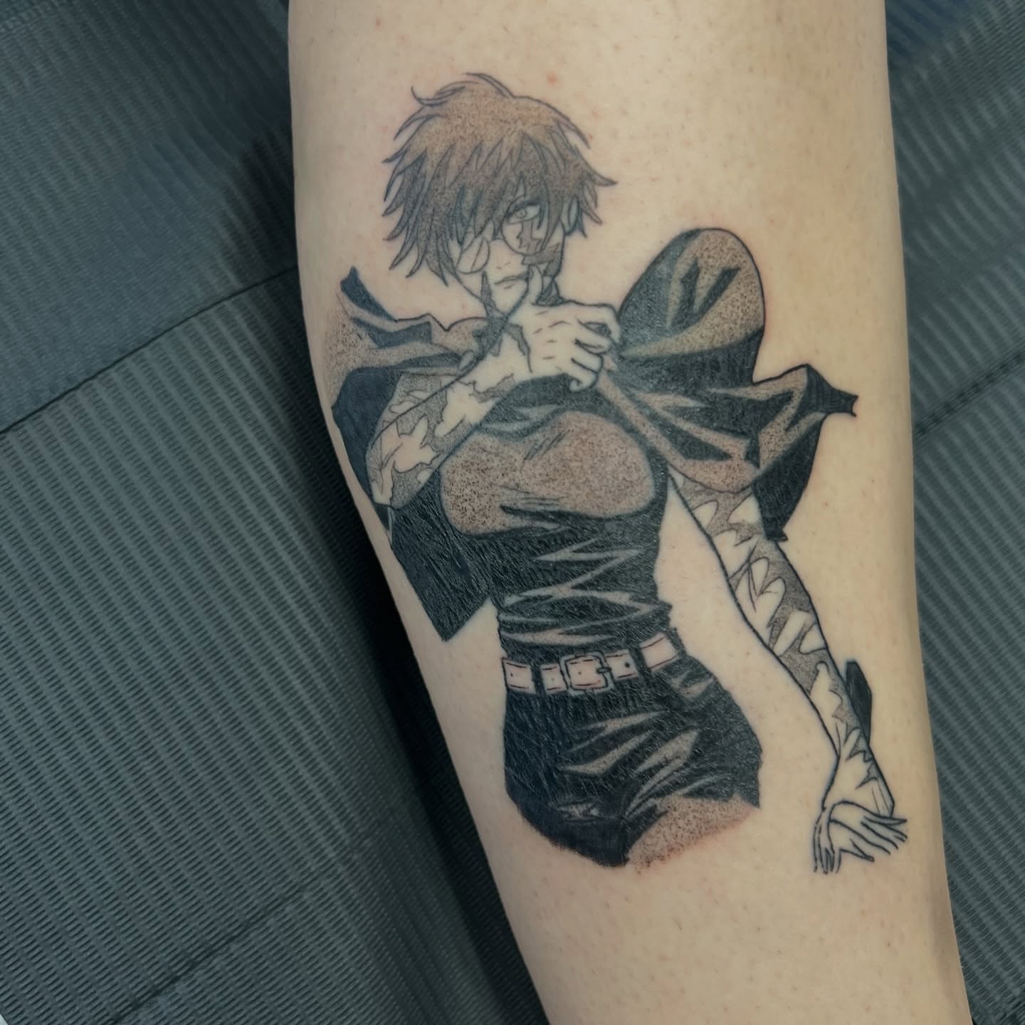 Anime character dotwork tattoo on the forearm by Leslie Paskoff