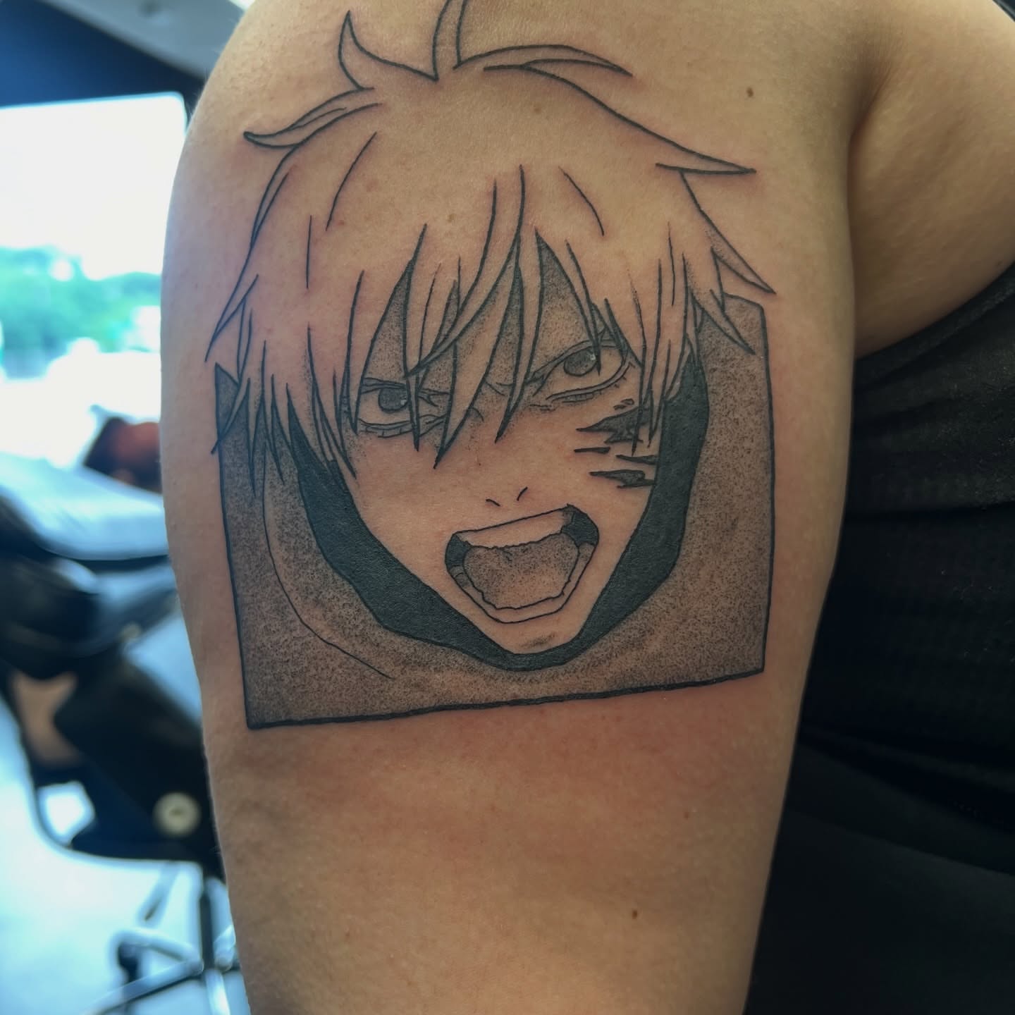 Anime character dotwork tattoo on the shoulder by Leslie Paskoff