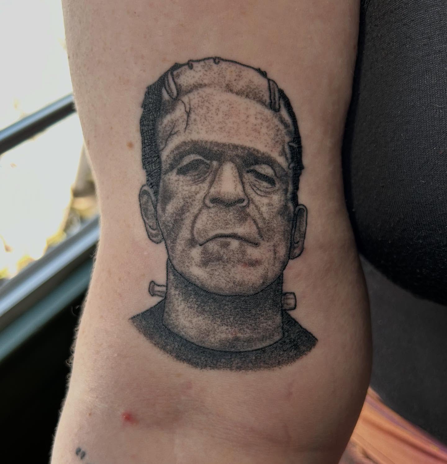 Frankenstein's monster portrait realism tattoo on the forearm by Jaime Gaiti