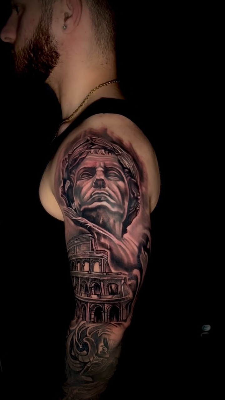 Bust of roman emperor and colosseum realism tattoo by Paul burrows (Tatttoo Artist)
