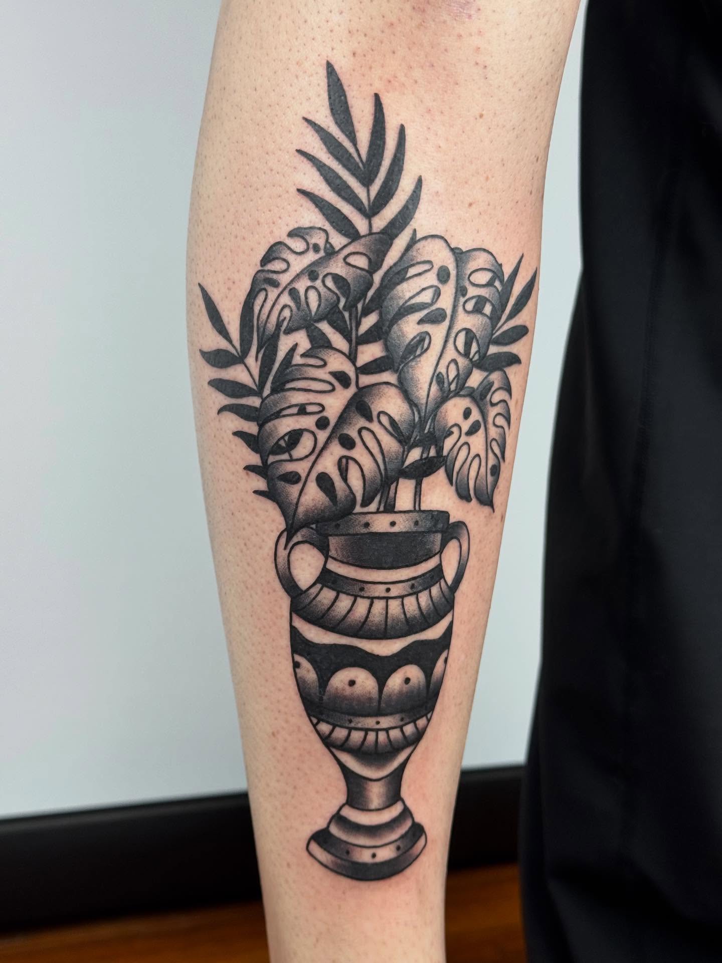 Plant in pot black and grey tattoo on the forearm by π©πͺπ¬