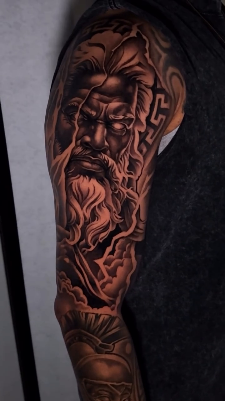 Greek god portrait realism tattoo by Miles Johnson