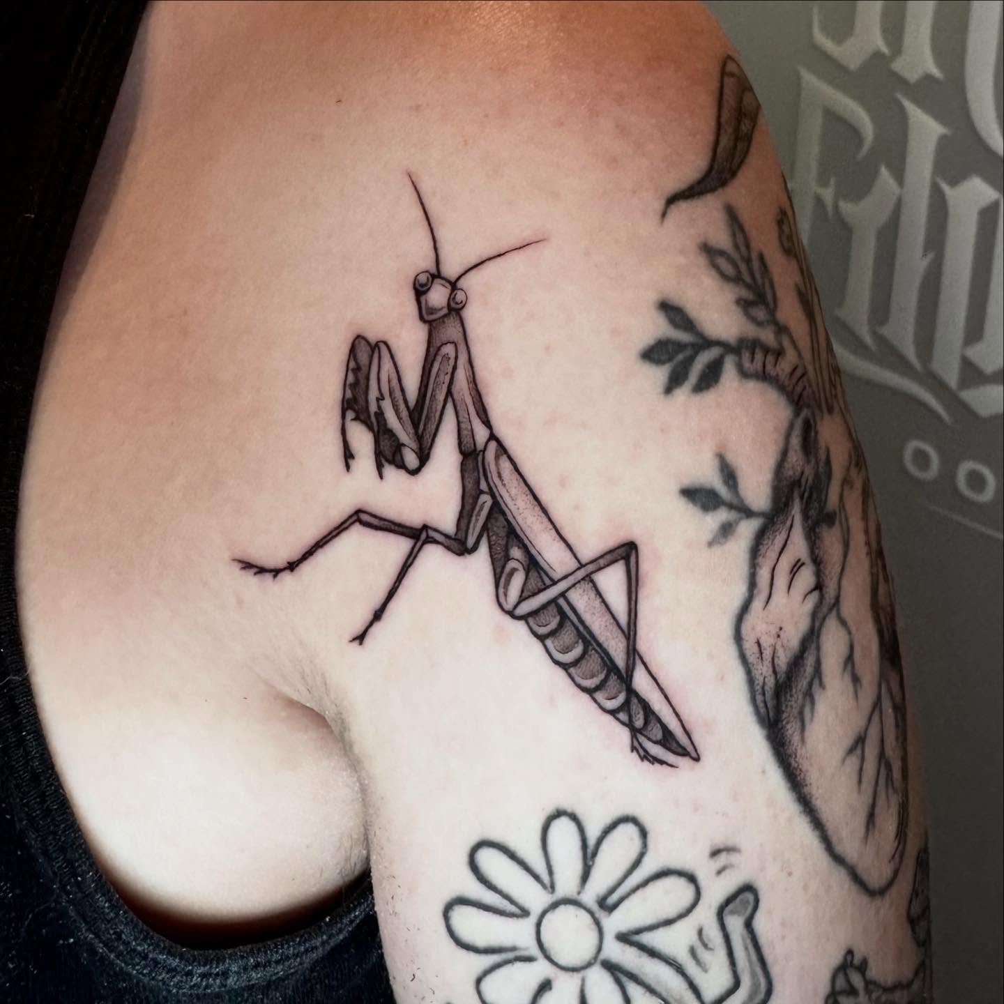 Praying mantis black and grey tattoo on the shoulder by Morgan Peeples
