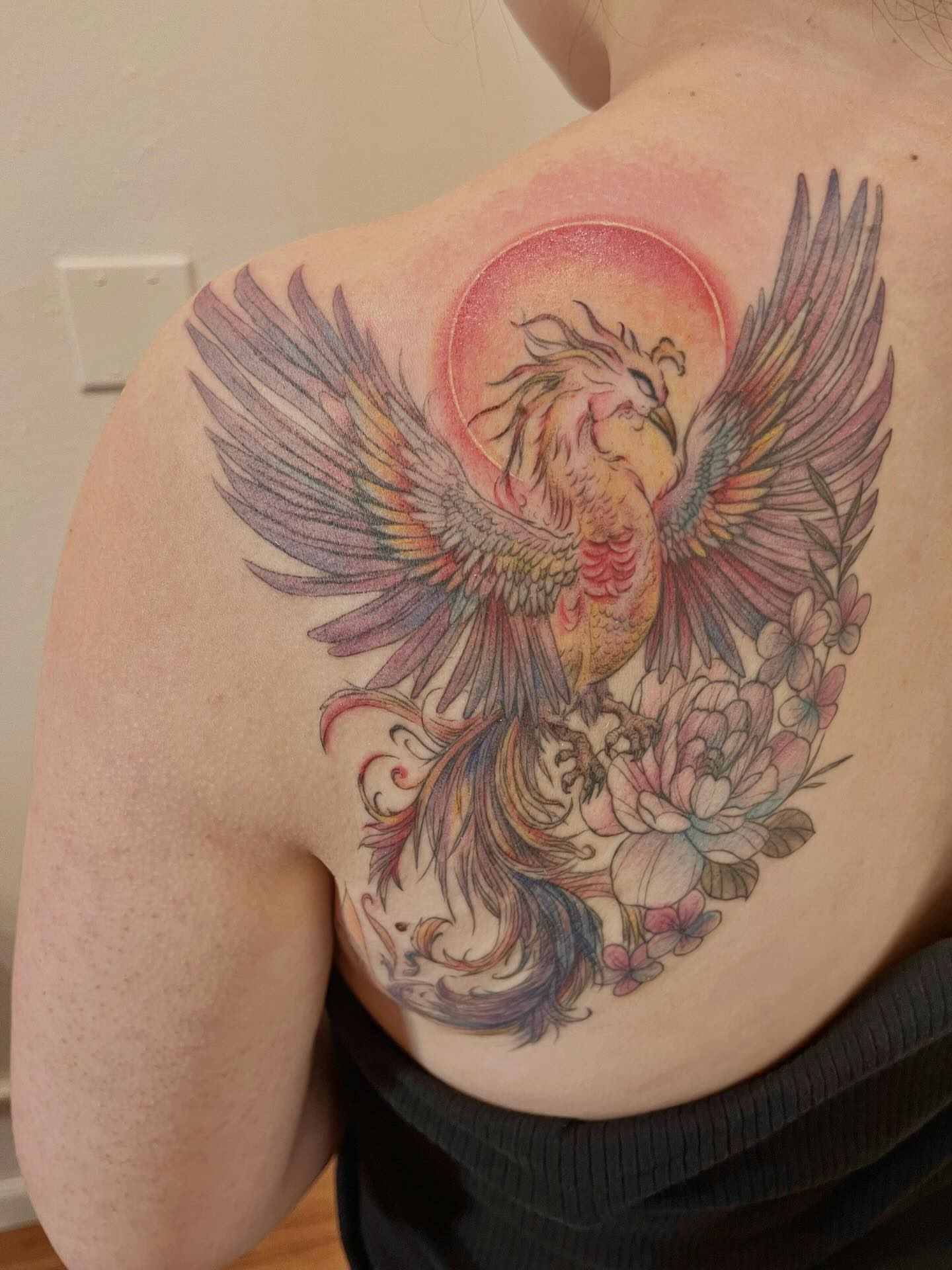 Phoenix new school tattoo on the shoulder by Kite.Tattoo_Amber