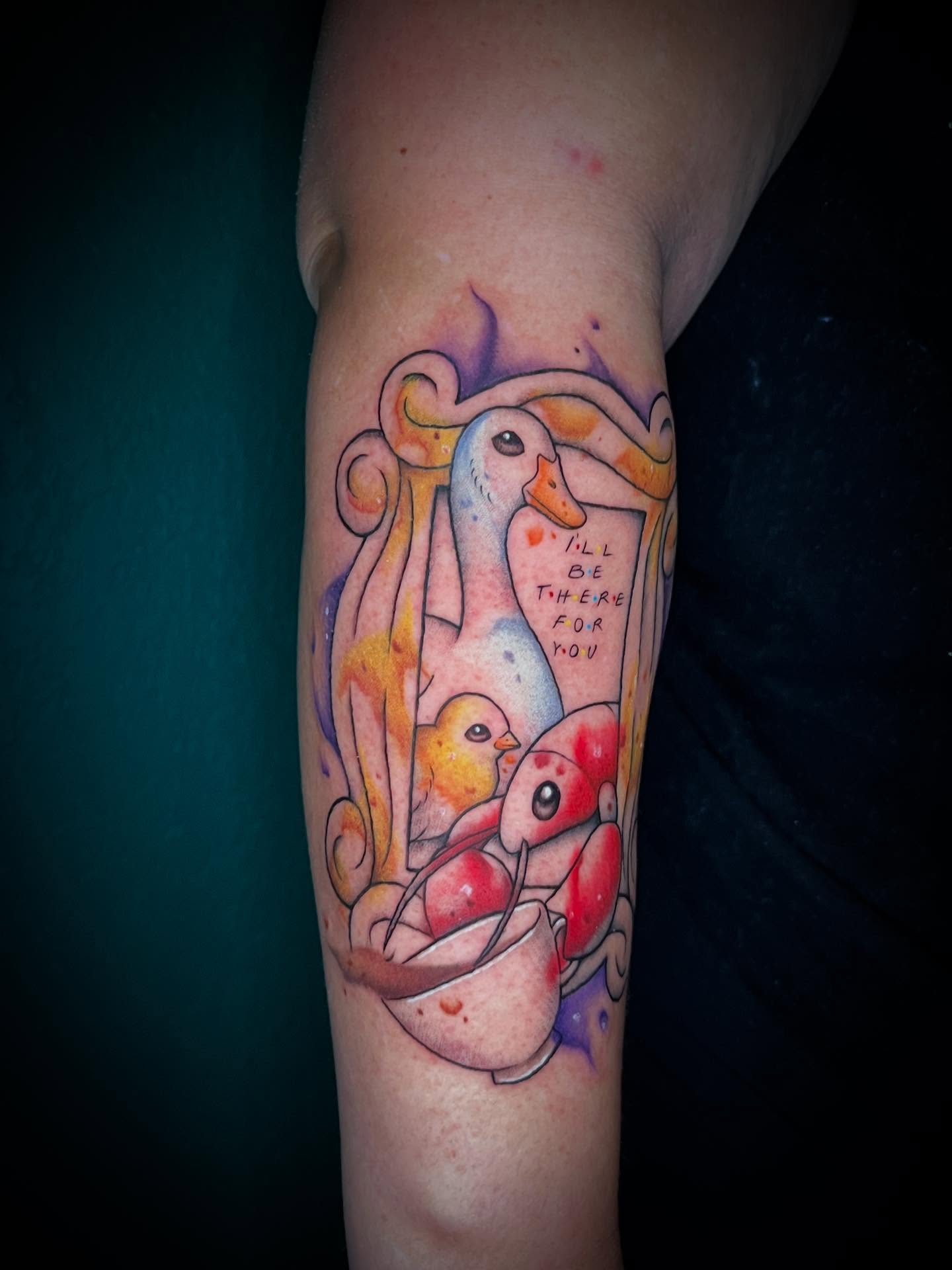 Geese and chicks watercolor tattoo on the forearm by Shelly Elissa Tattoos