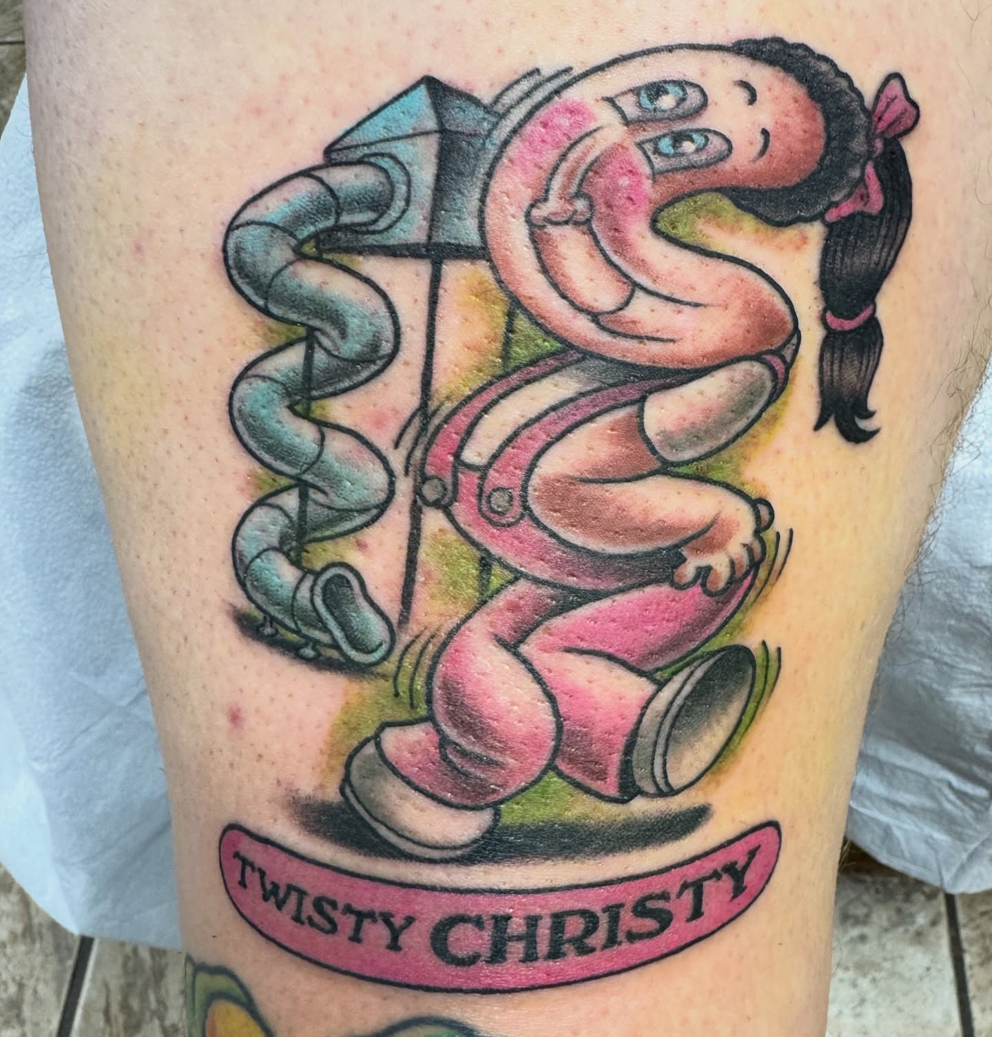 Twisty Christy American traditional tattoo on the thigh by Cary Aldridge